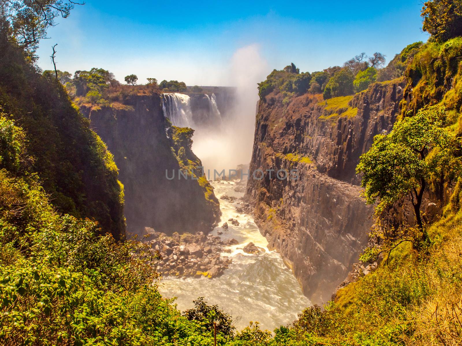 Victoria Falls on Zambezi River. Dry season. Border between Zimbabwe and Zambia, Africa.