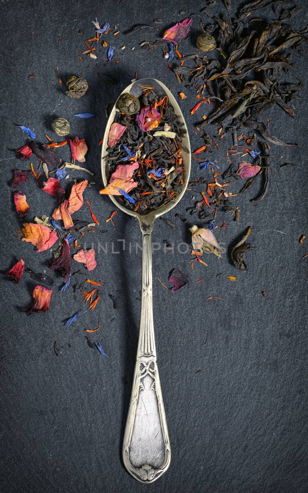 Assortment of dry tea on ardesia plate