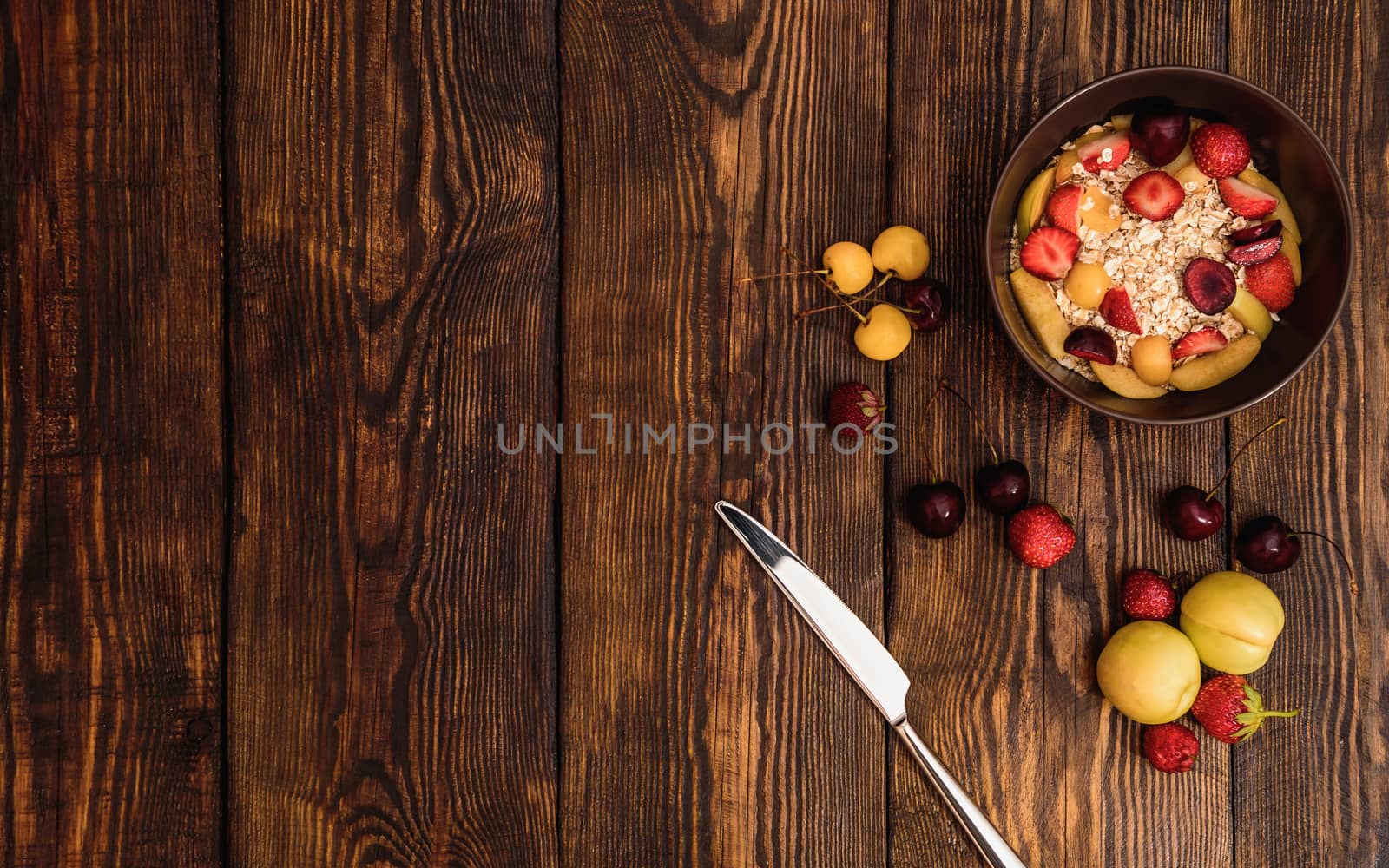 Breakfast with porridge, ripe fruits and berries by Seva_blsv