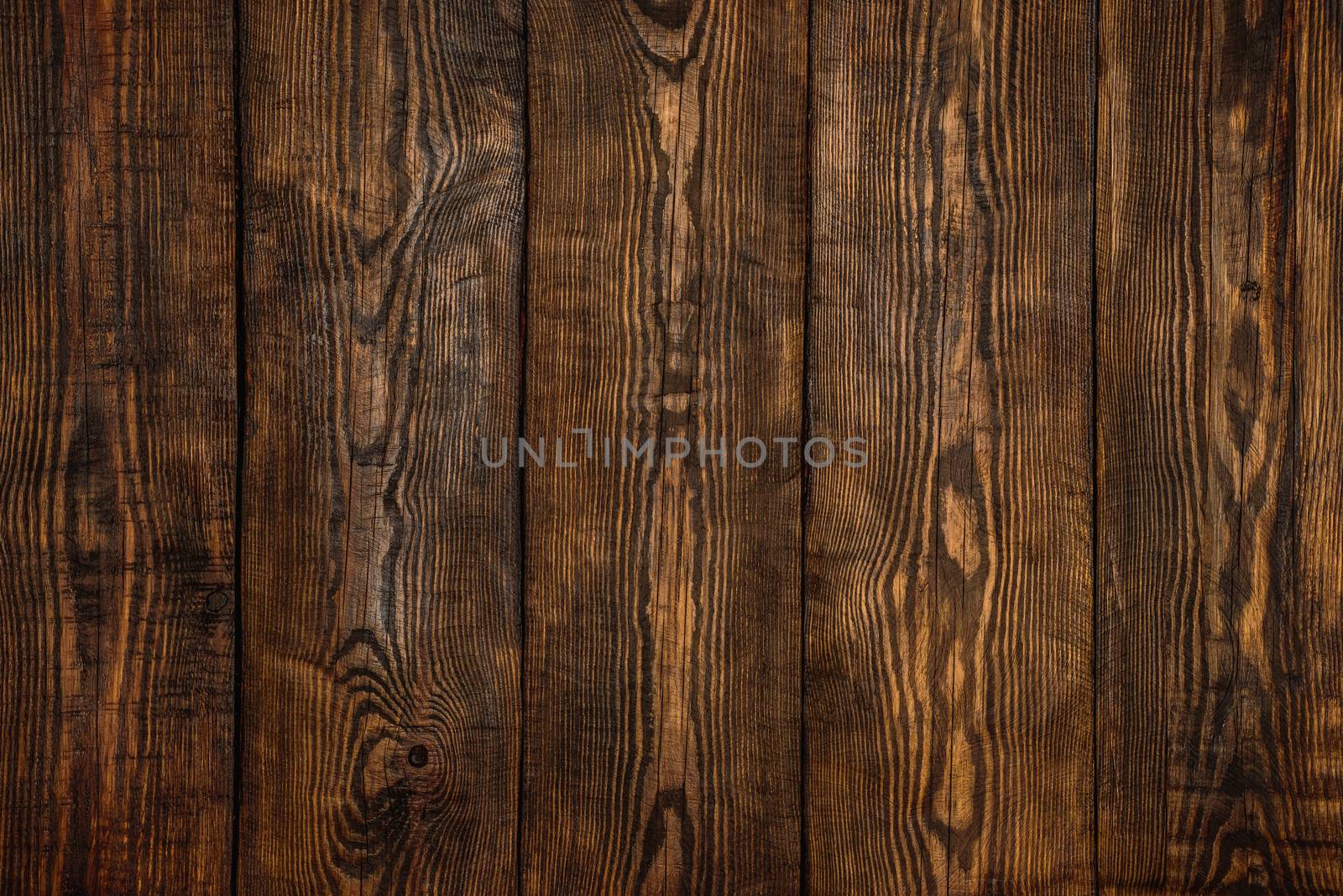 weathered wooden texture or background old panels with cracks, scratches, swirls, notch and chips