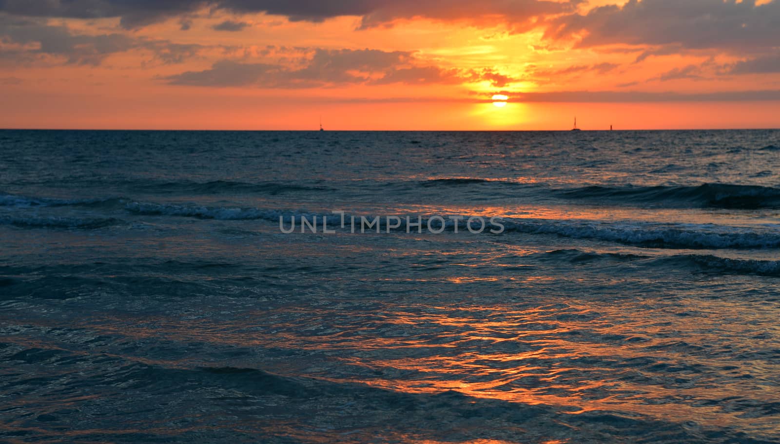 Sunset in the evening on a sea beach