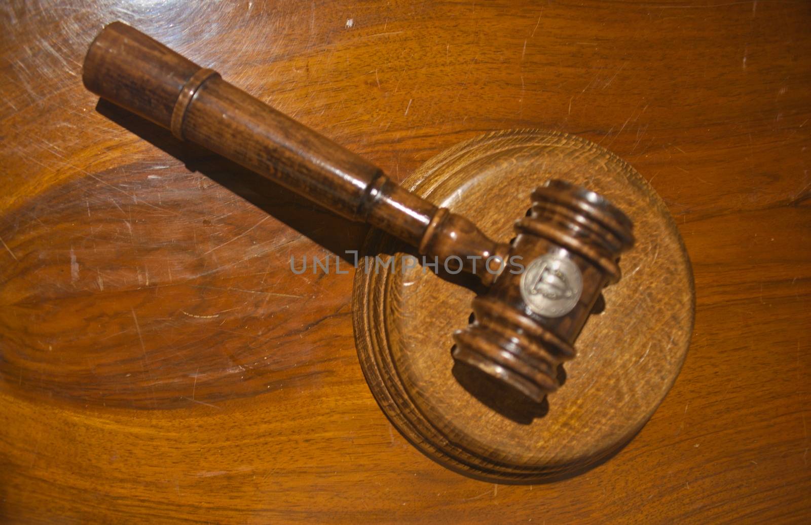 Judge courtroom gavel on wooden table, closeup by sheriffkule