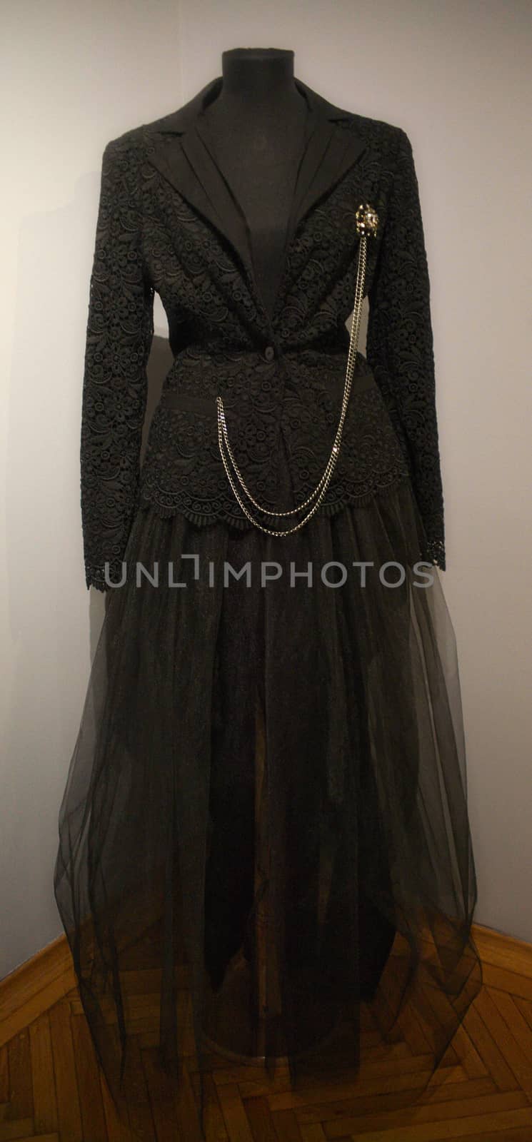 Elegant vintage woman black dress in museum