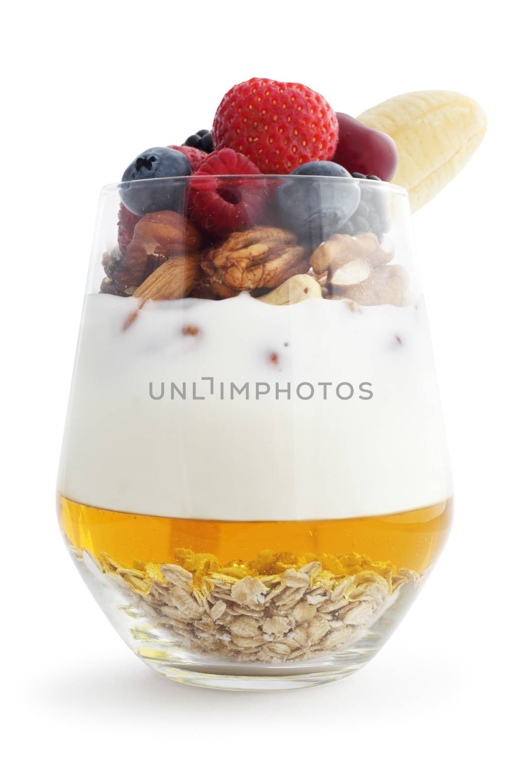 Breakfast smoothie ingredients in glass, cooking making concept, isolated on white background. Milkshake. Protein diet. Healthy food concept. Drink, oat flakes, milk, yoghurt, honey, nuts, berries, banana
