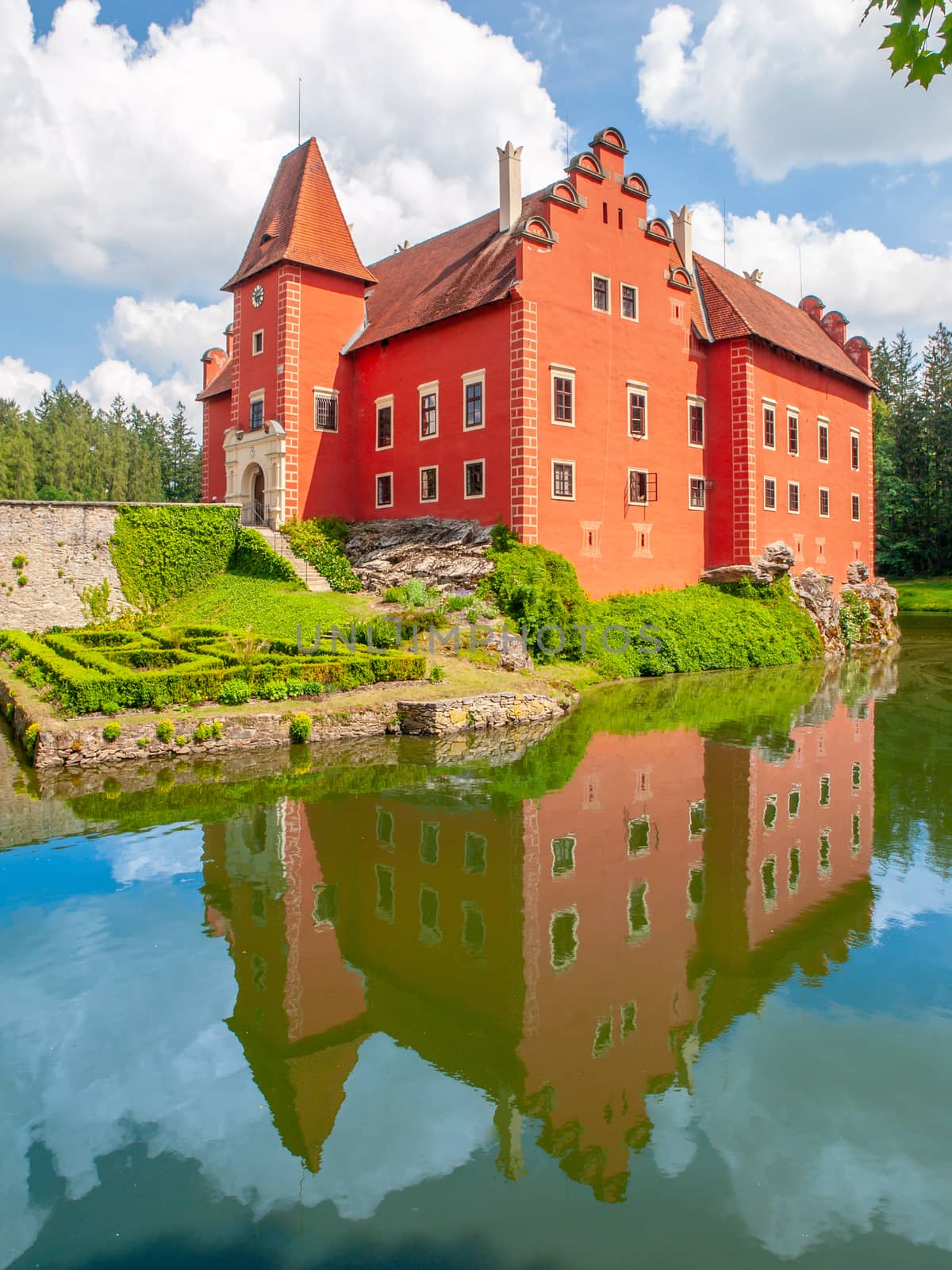 Renaissance chateau Cervena Lhota in Southern Bohemia, Czech Republic. Idyllic and picturesque fairy tale castle on the small island reflected in the romantic lake by pyty