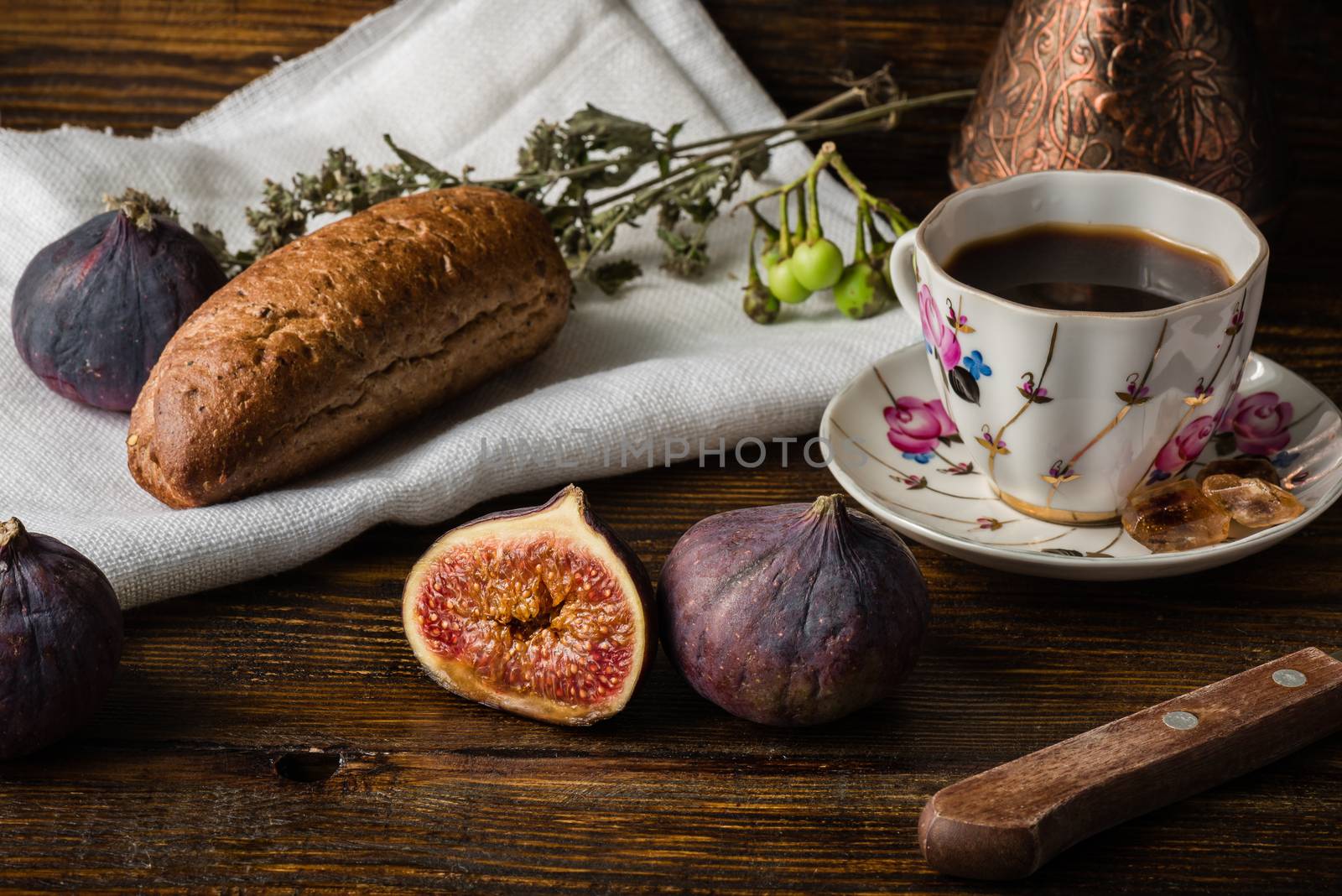 Light breakfast with coffee, bun and few figs. by Seva_blsv