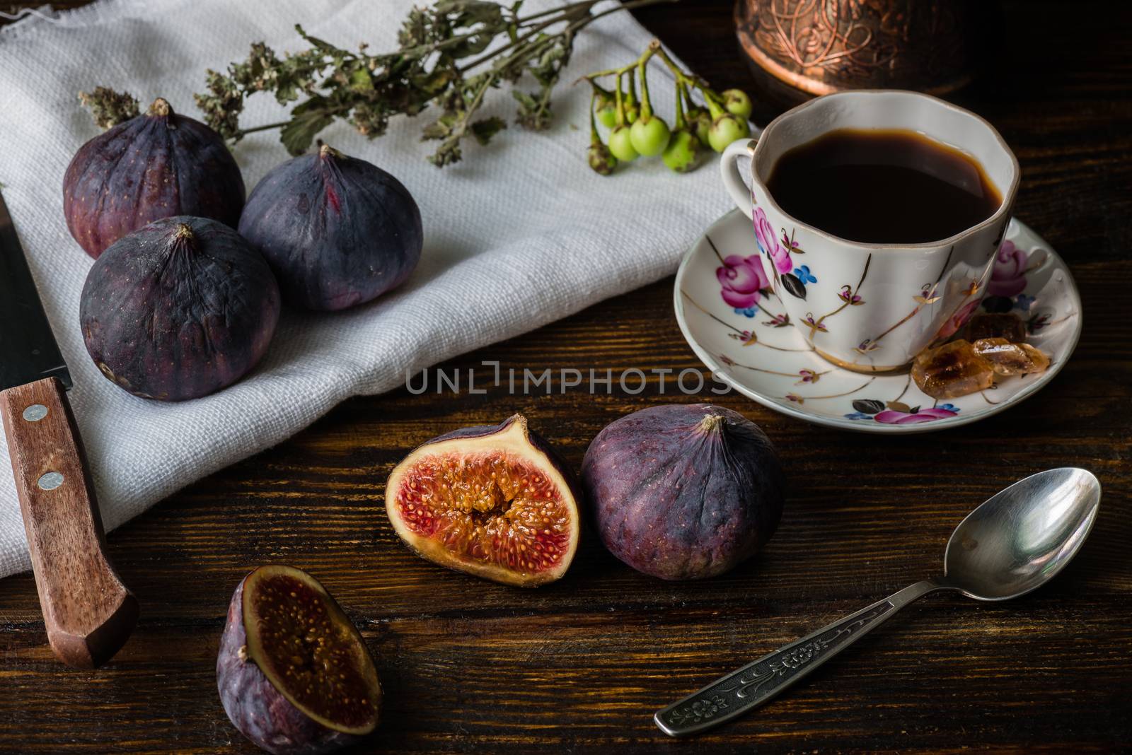 Seasonal and exotic fig with coffee cup for healthy and tasty breakfast.