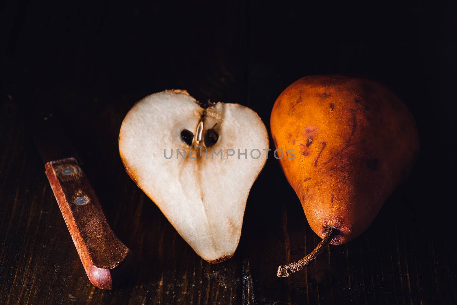Golden Pear and Knife by Seva_blsv