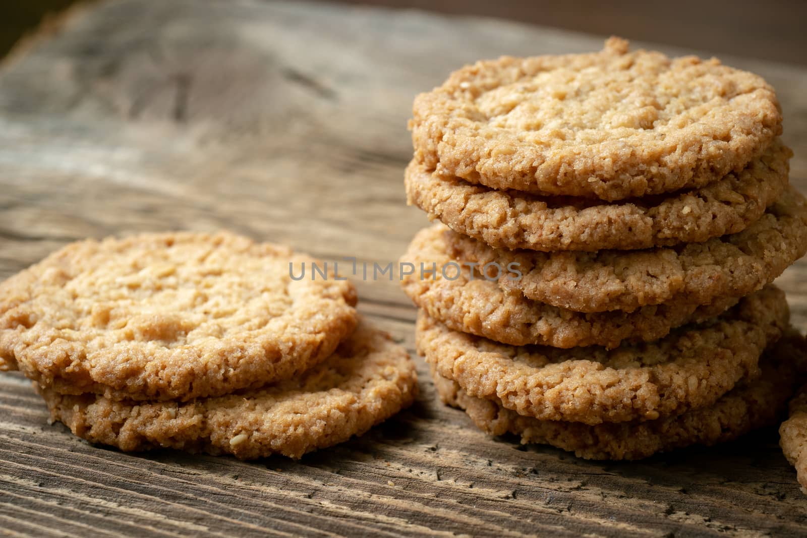 Various tasty cookies biscuits on wooden background by xtrekx