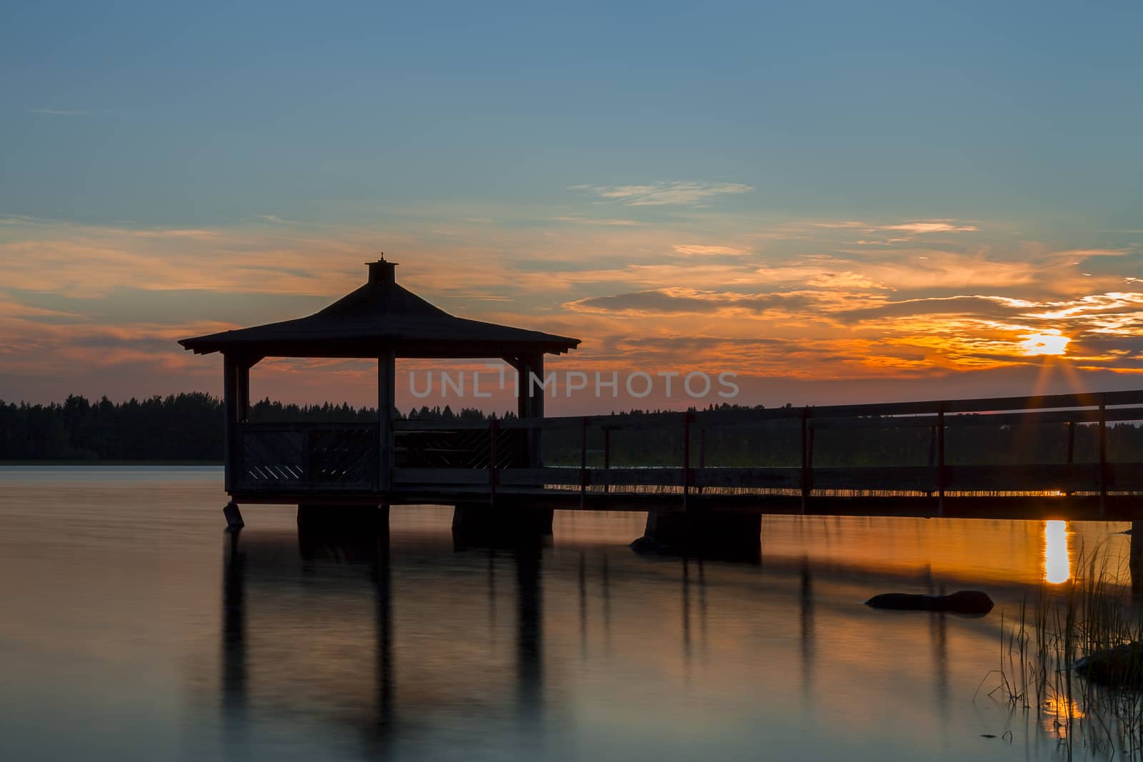 Gazebo in Lake wat Sunset.