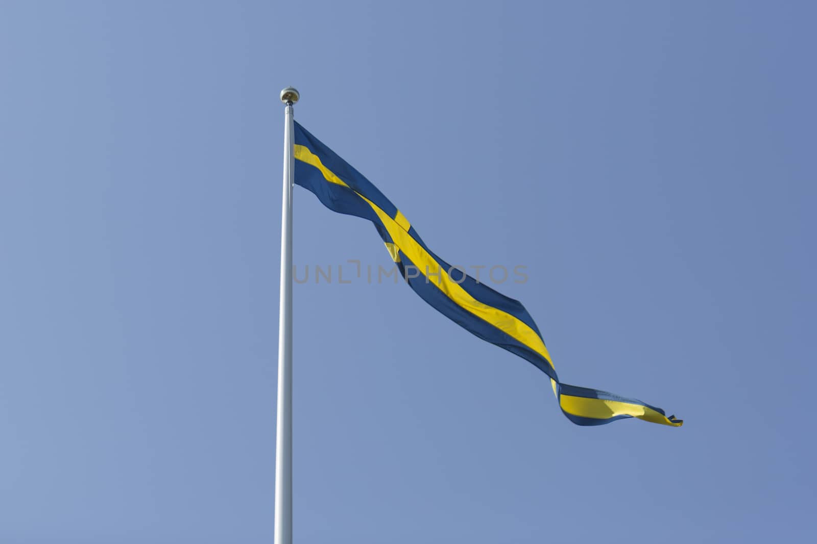 Swedish Pennant with a clear blue sky.