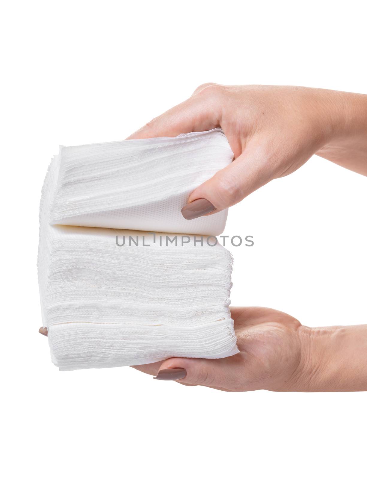 pack of napkins in hands on white background isolated