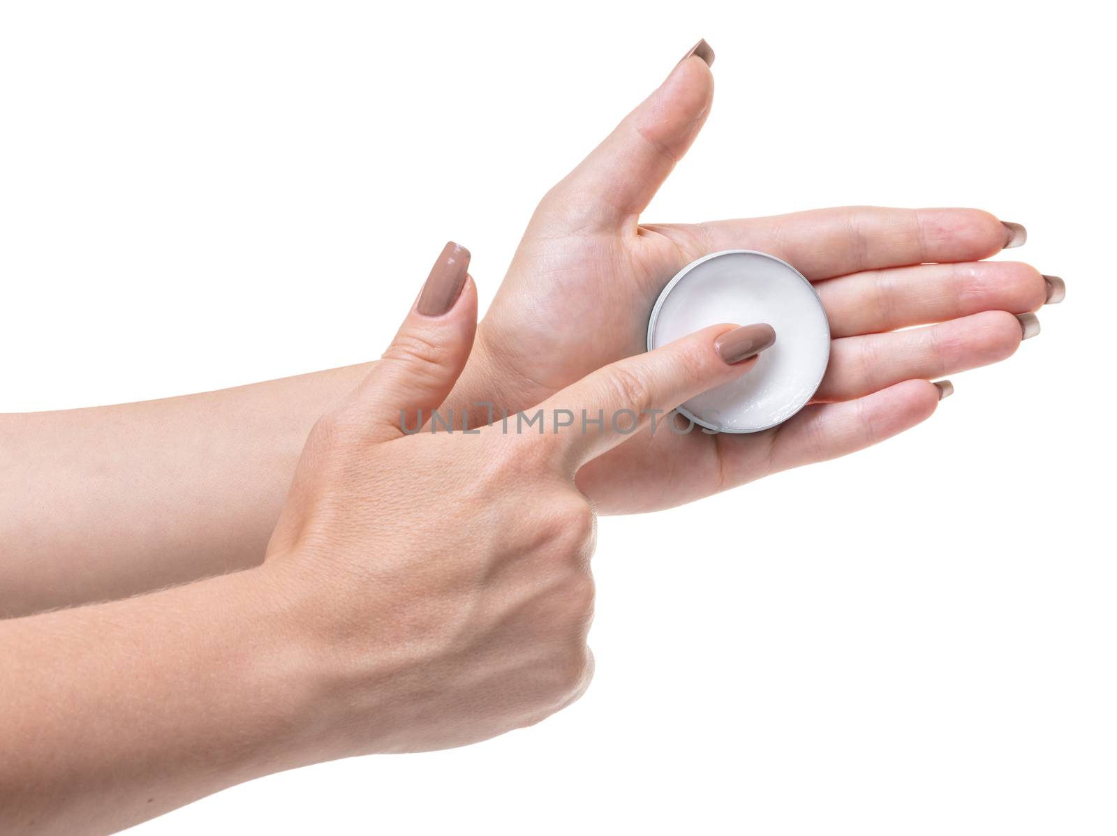 jar with lip cream in hand on white isolated background