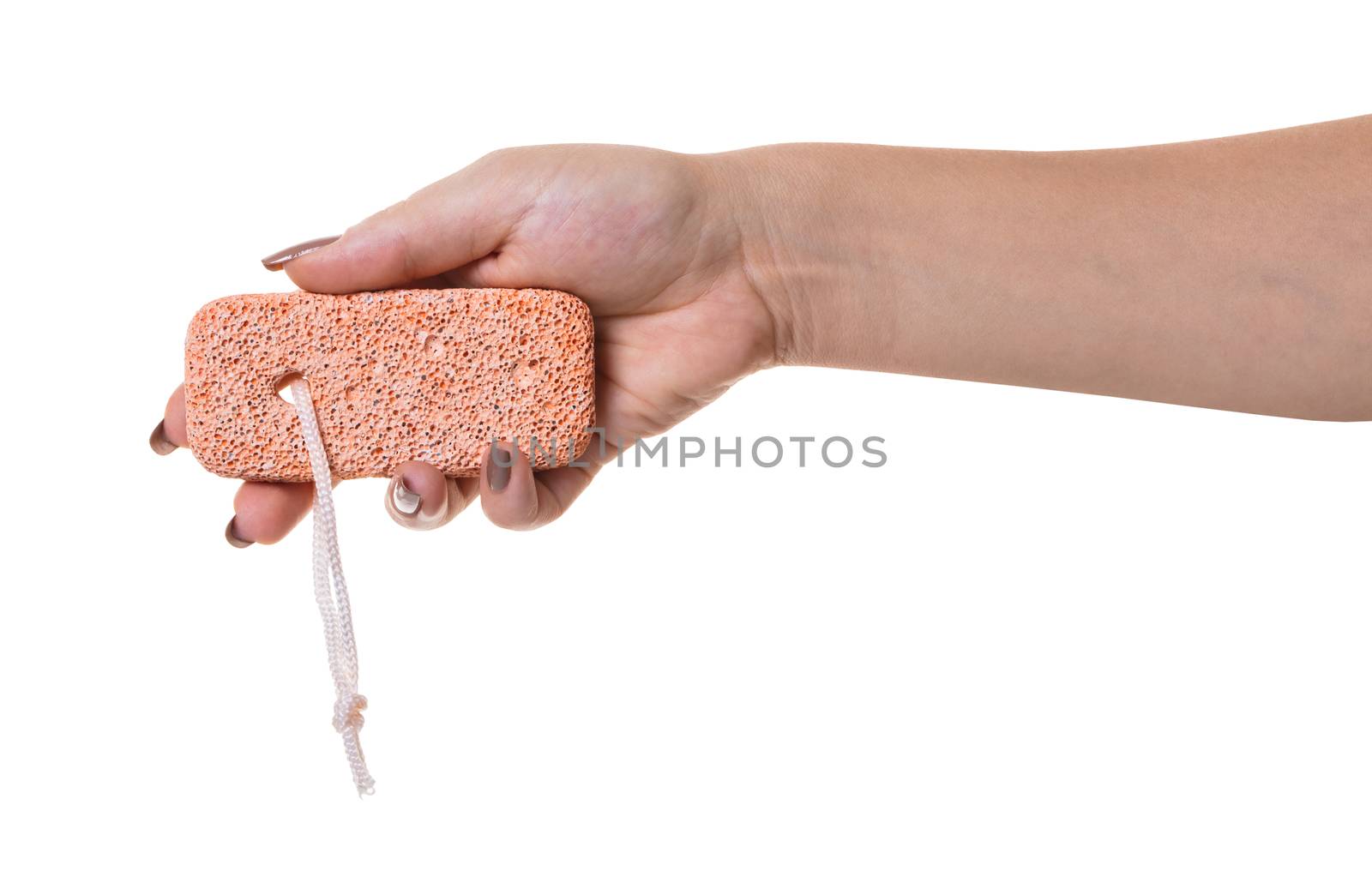 pumice stone in female hand on white isolated background