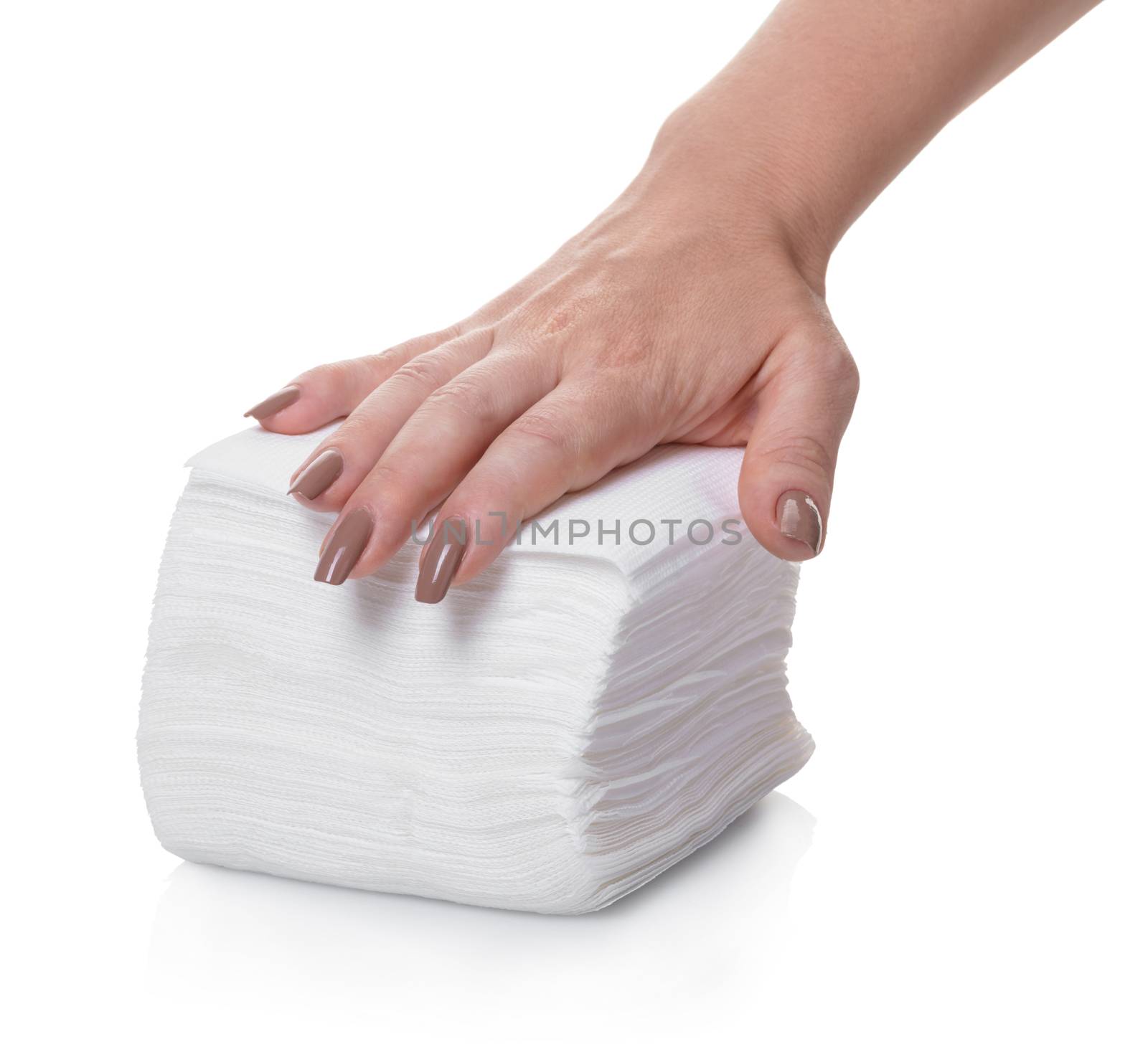 pack of napkins in hand on white background isolated