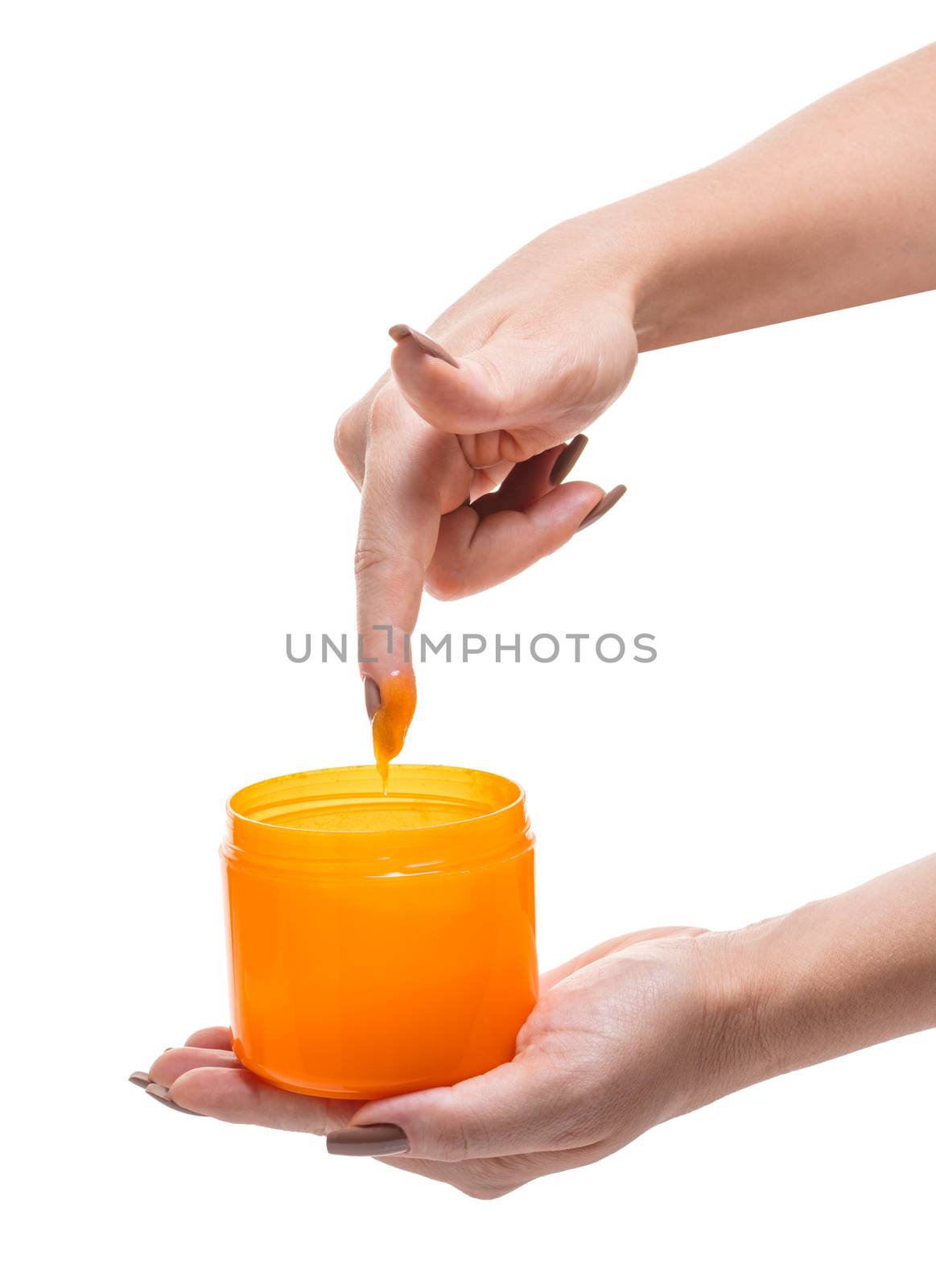 bank with cosmetic cream in hands on white background isolated