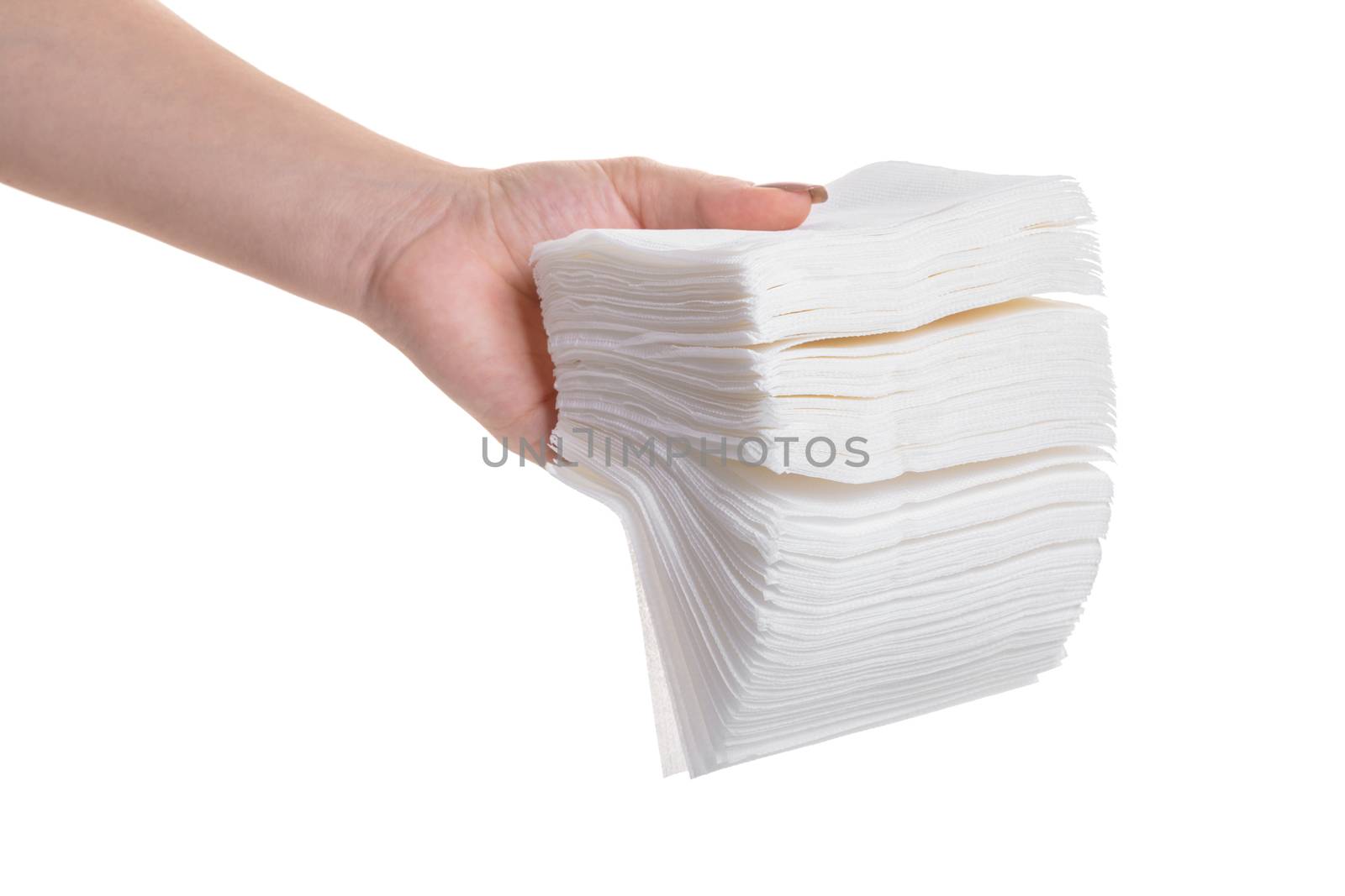 pack of napkins in hand on white background isolated