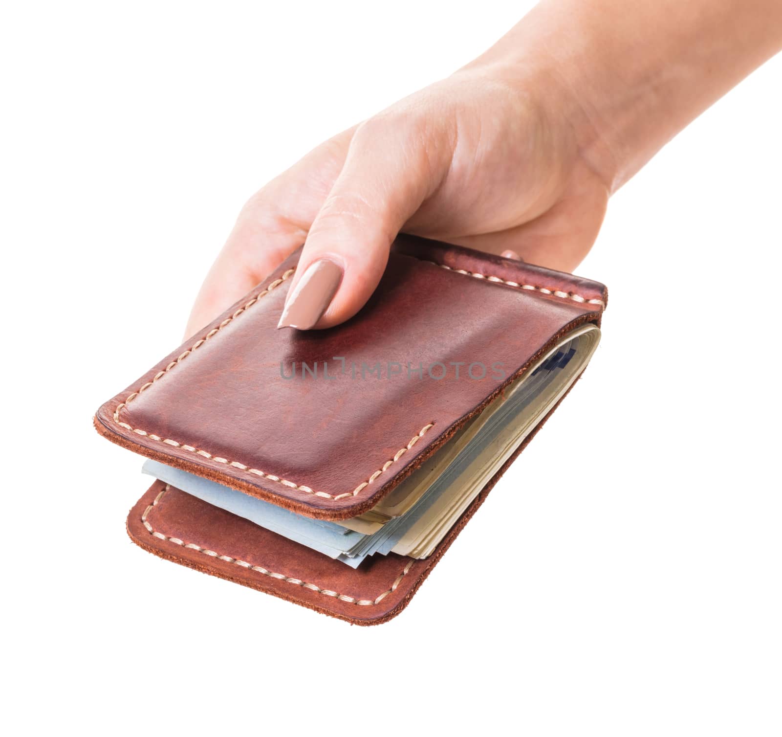 purse with money in hand on white isolated background