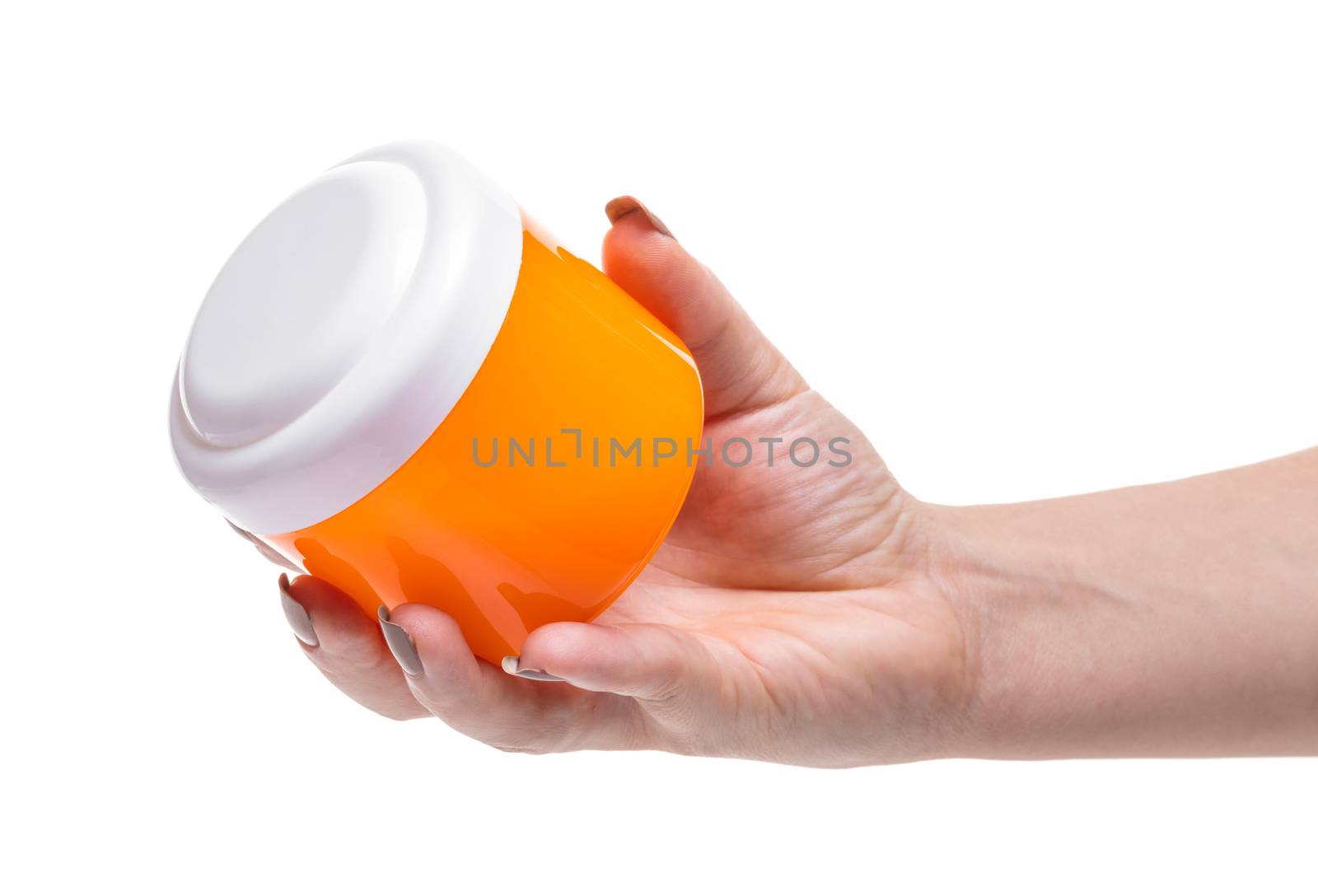 bank with cosmetic cream in hand on white background isolated