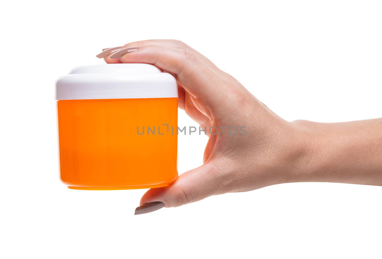 bank with cosmetic cream in hand on white background isolated