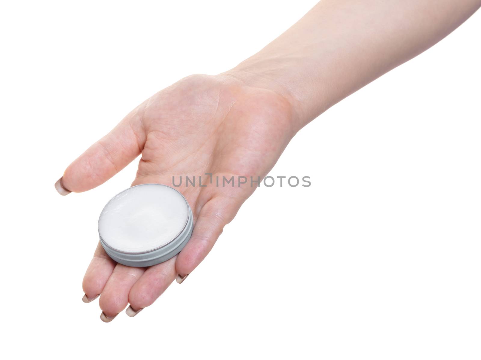 jar with lip cream in hand on white isolated background