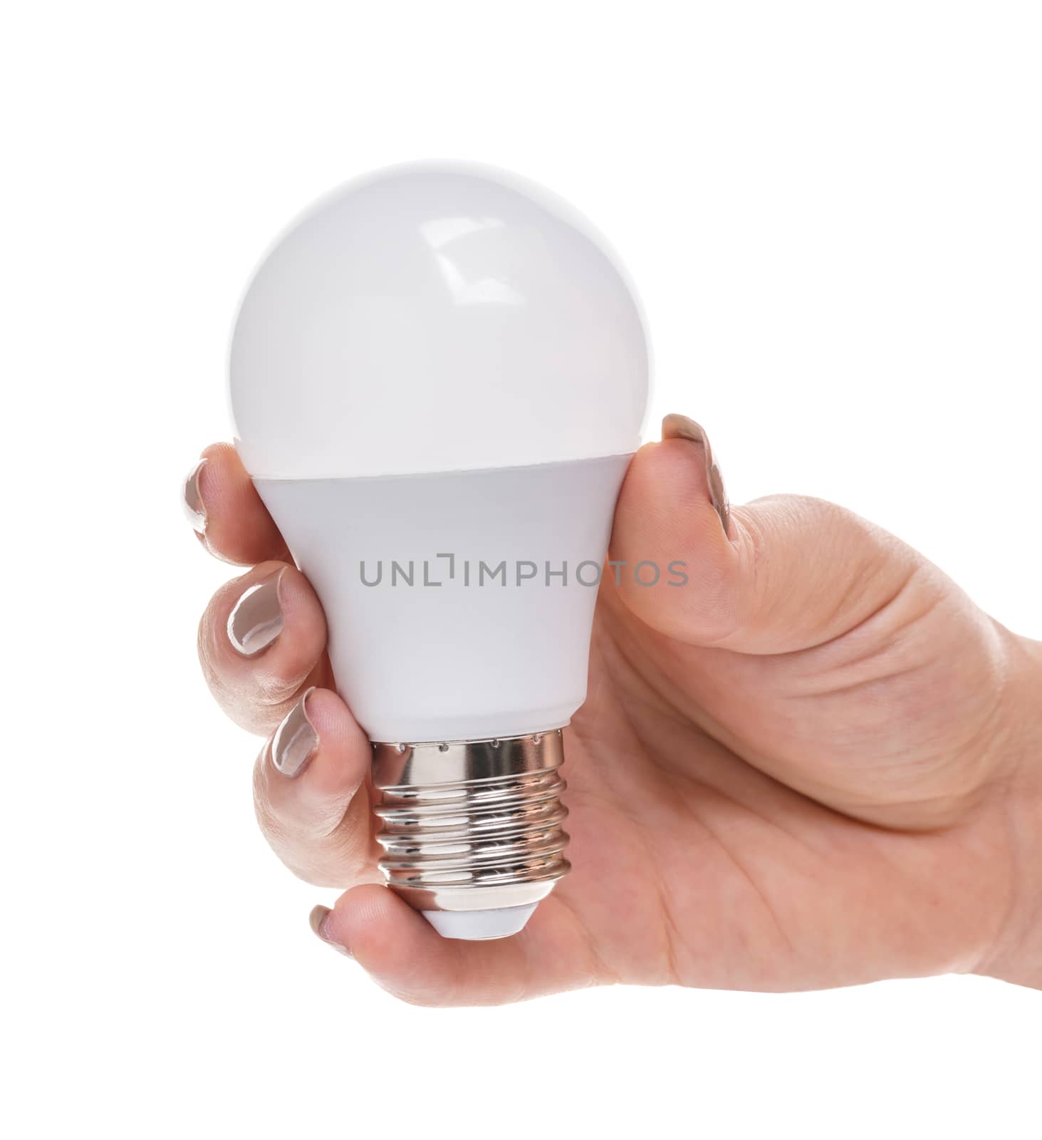 light bulb in a female hand on white background isolated