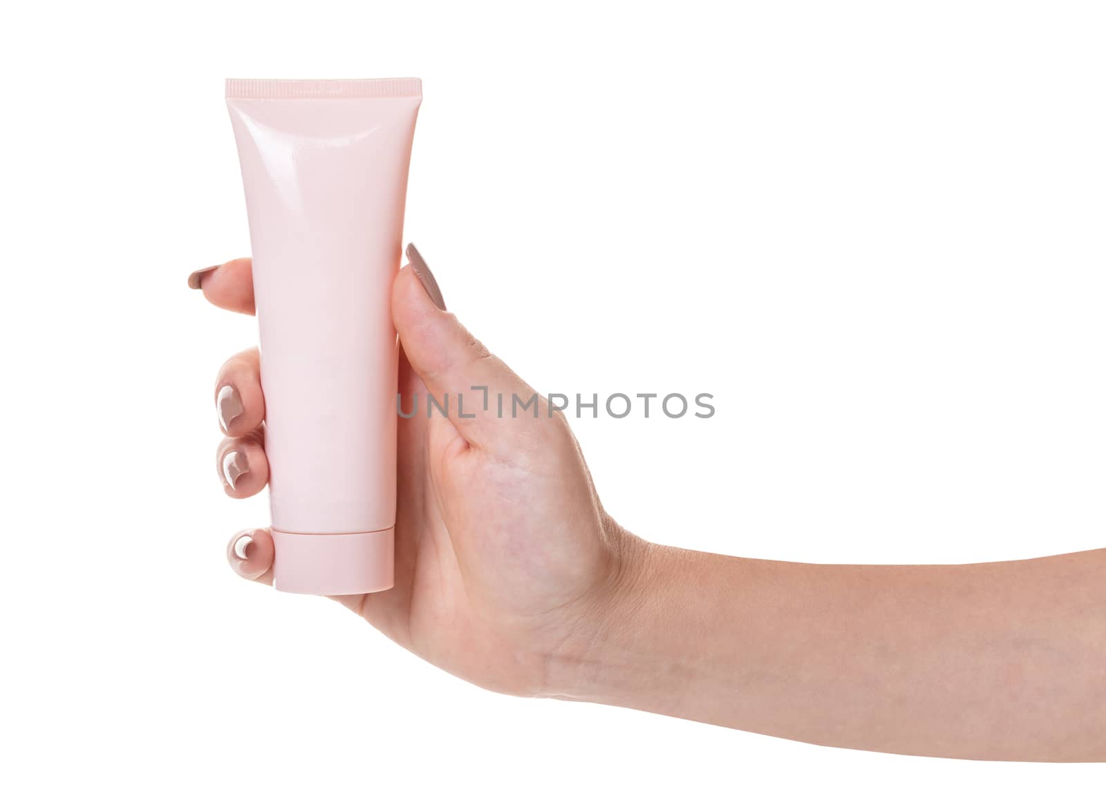 Female hand with a tube of cosmetic cream  by MegaArt