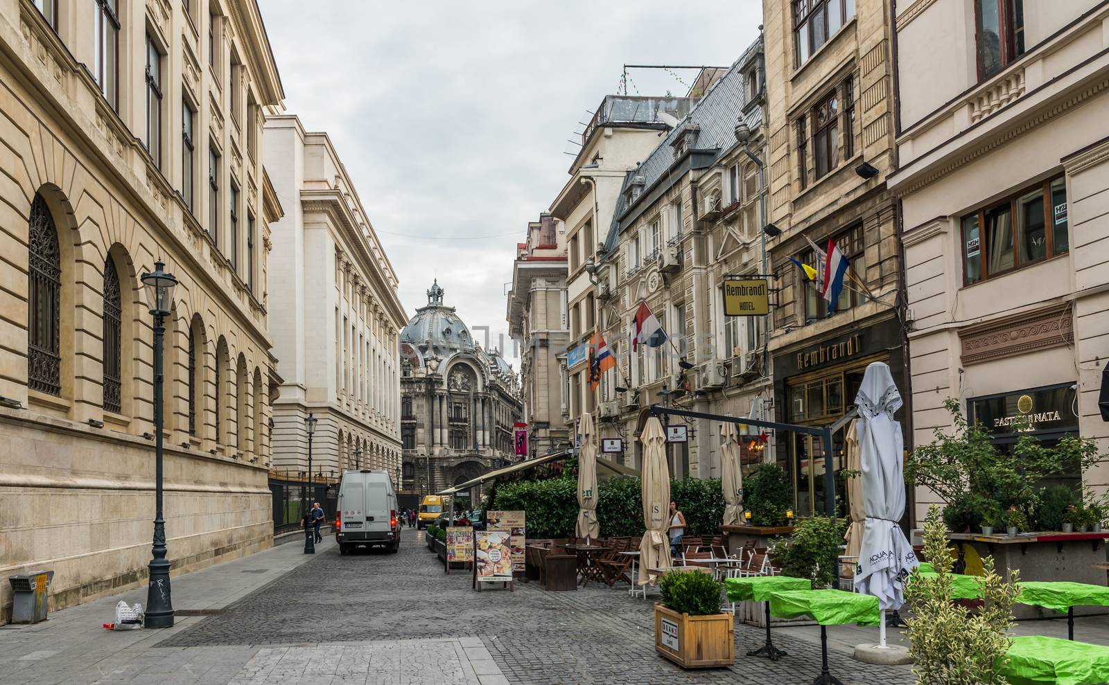 BUCHAREST, ROMANIA - 07.20.2018. Old Center of Bucharest, Romania in a cloudy summer morning. Sullen and unpleasant atmosphere, dirty streets and shabby buildings.