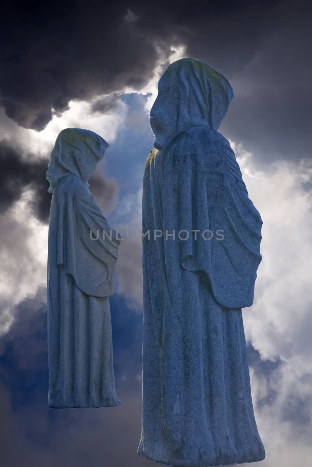 faceless monk statues at the town of fermoy in county cork ireland with clipping path