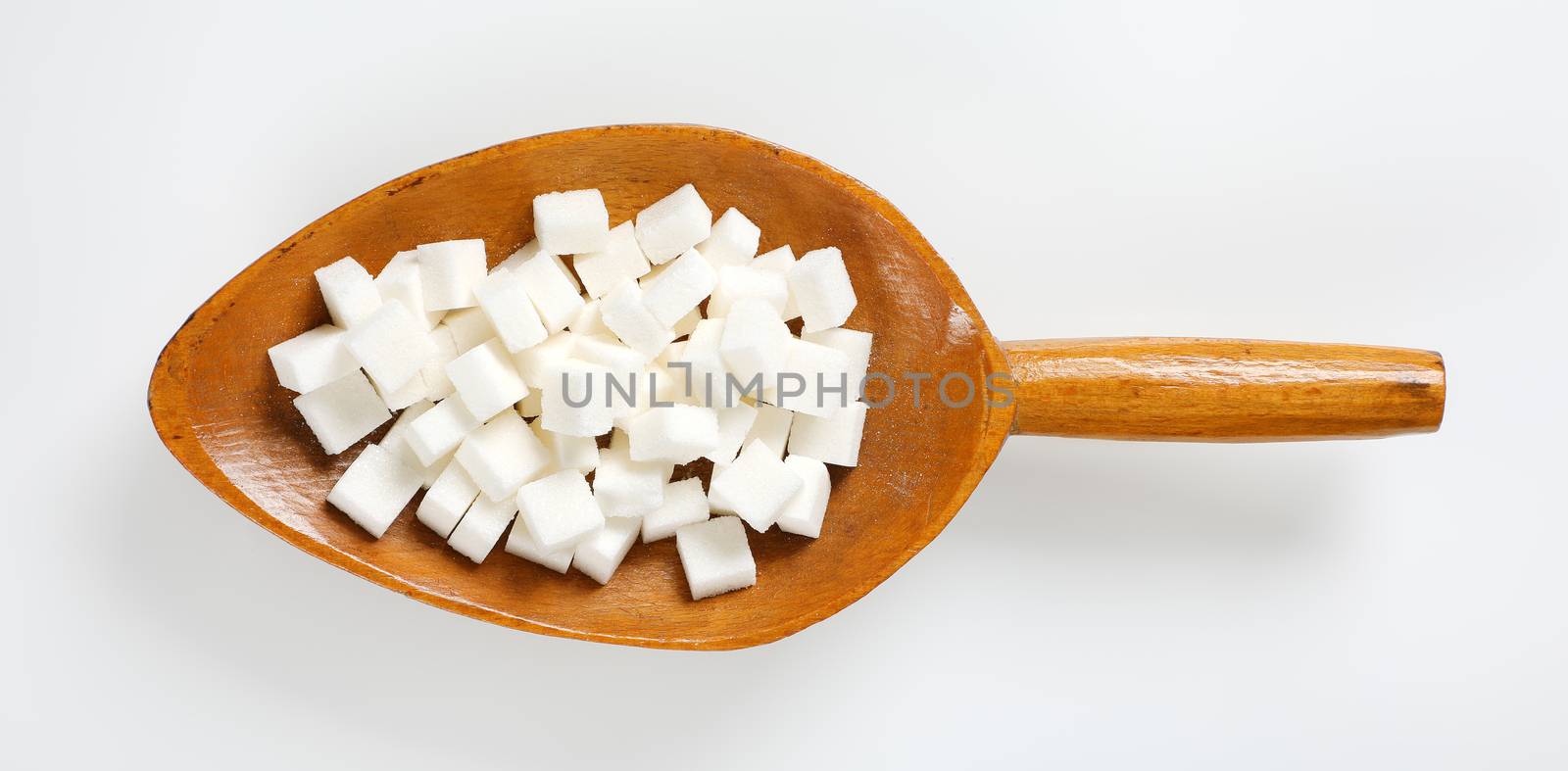 white sugar cubes by Digifoodstock