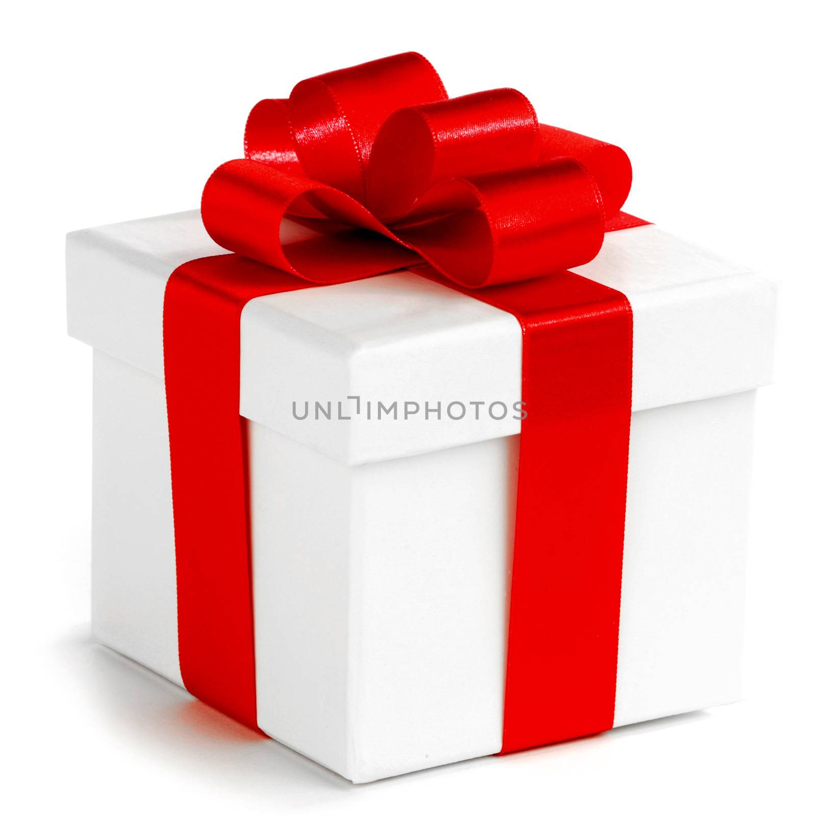 White gift box with red ribbon isolated on white background