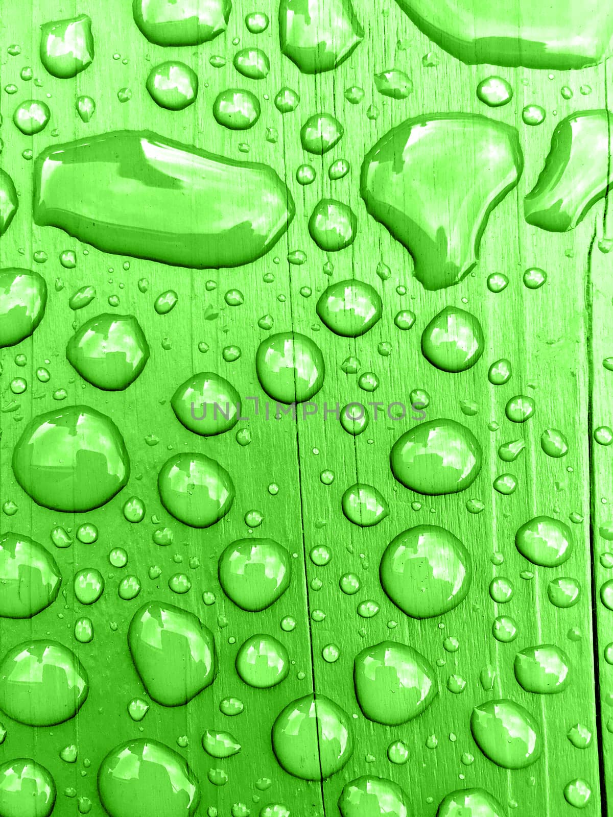 rain drops on on Green wooden bench