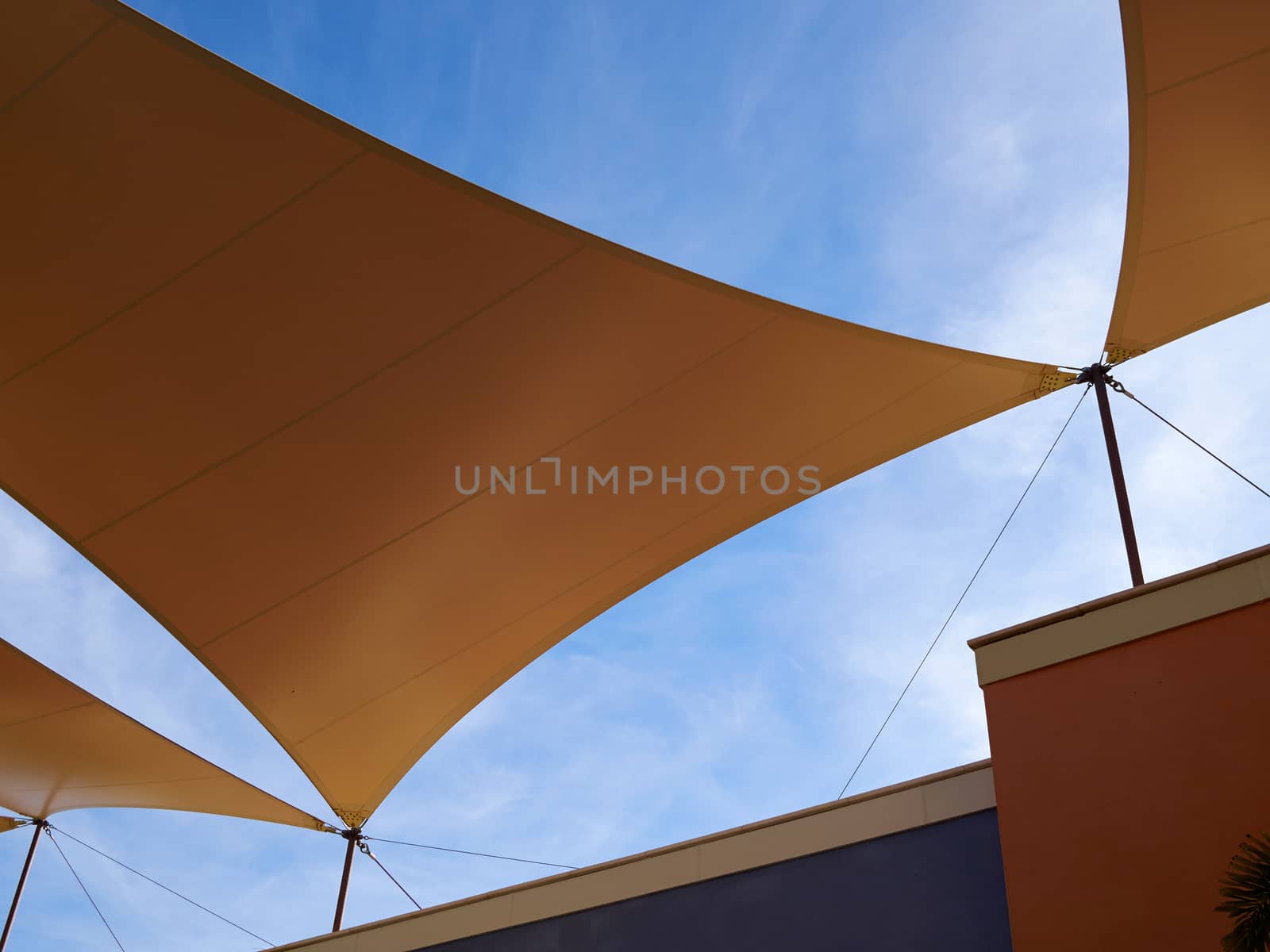 Modern design pergola arbor made with cloth fabric with background of blue summer sky