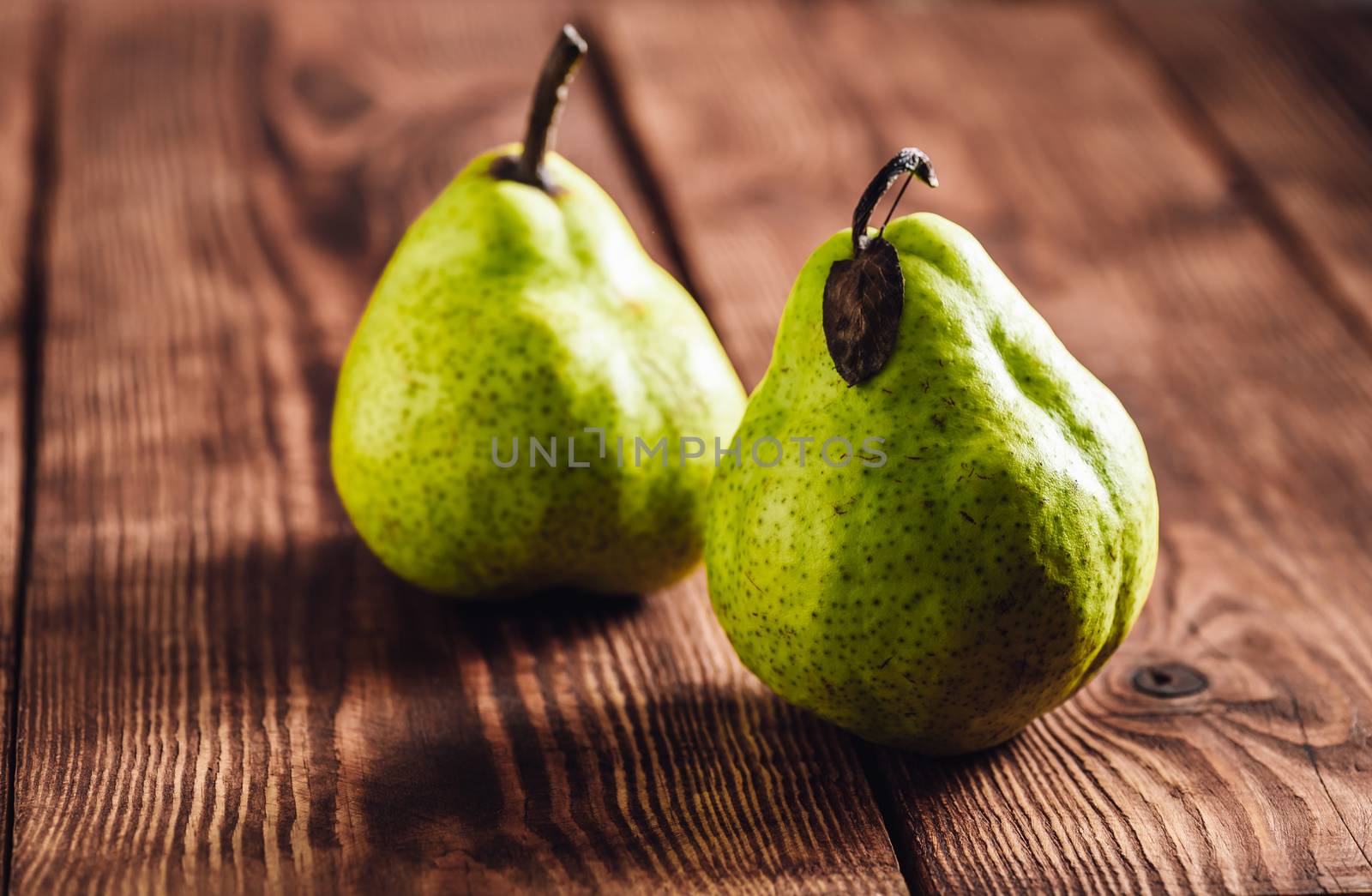Two Pear on Wooden Background. by Seva_blsv