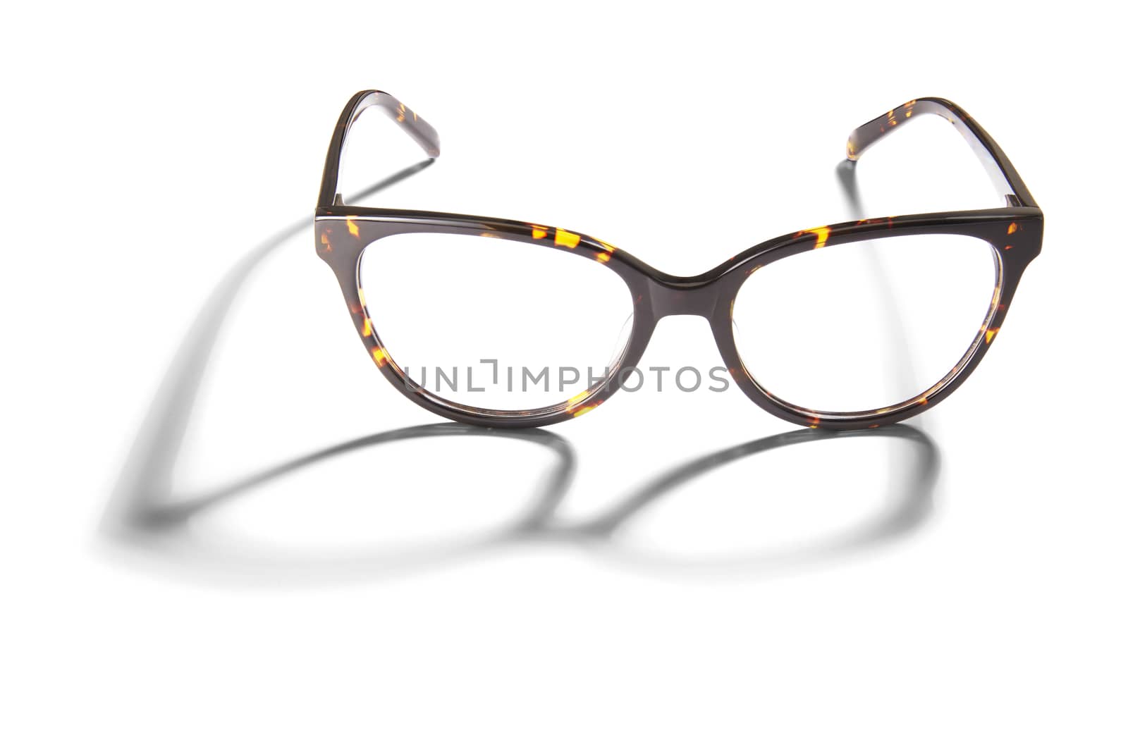 Advertising photo of glasses with shadow isolated on white background.