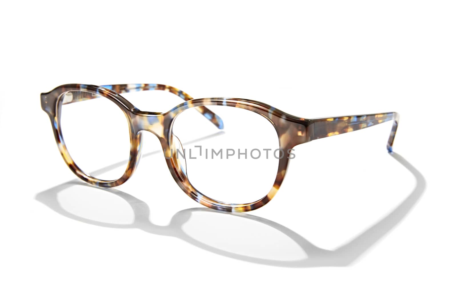 Advertising photo of glasses with shadow isolated on white background.