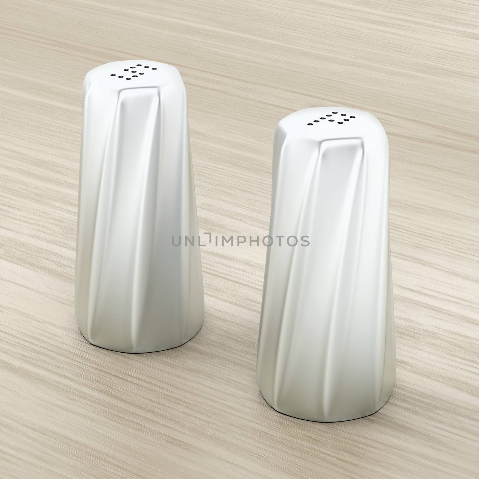 Metal salt and pepper shakers on wood background  