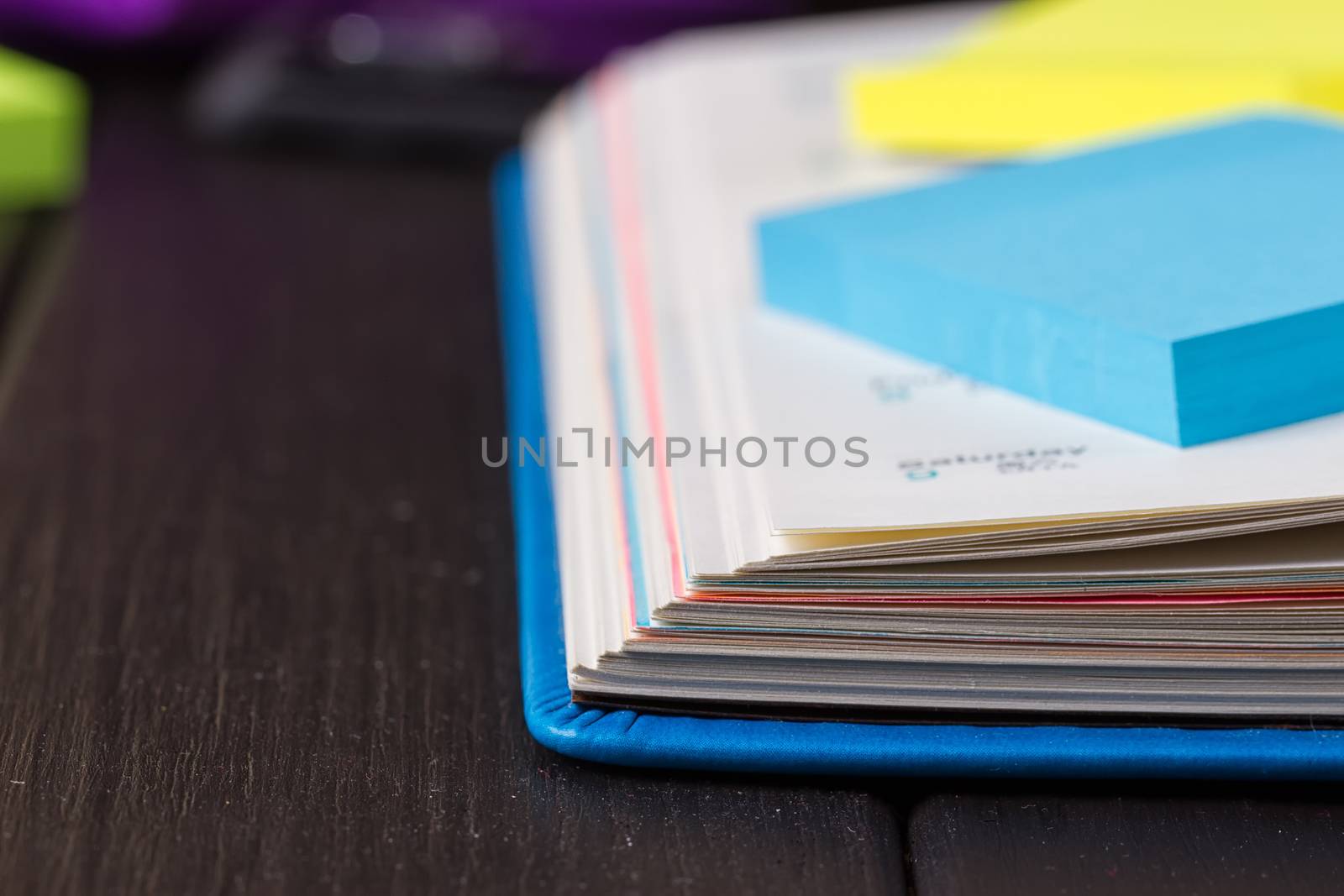 Planning your day, A day blank day planner with a blue pen
