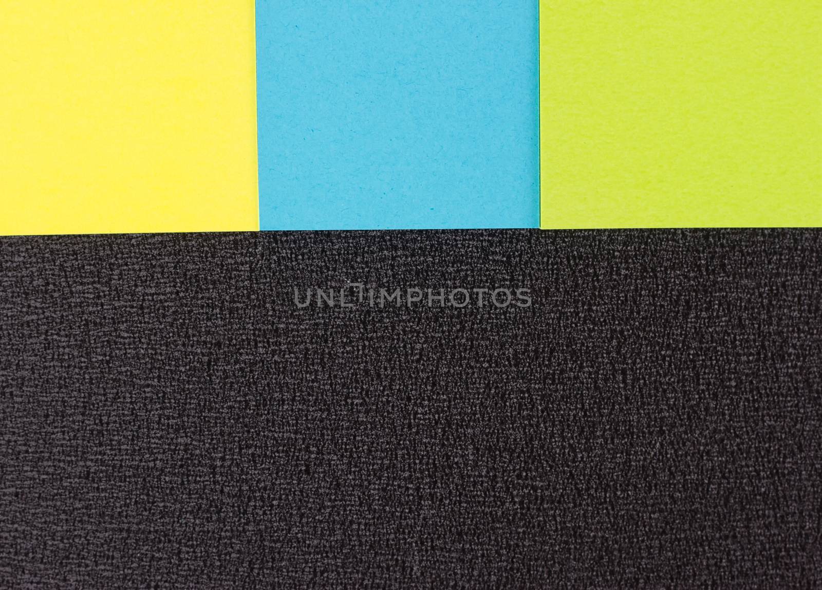 background of colored stickers on the black