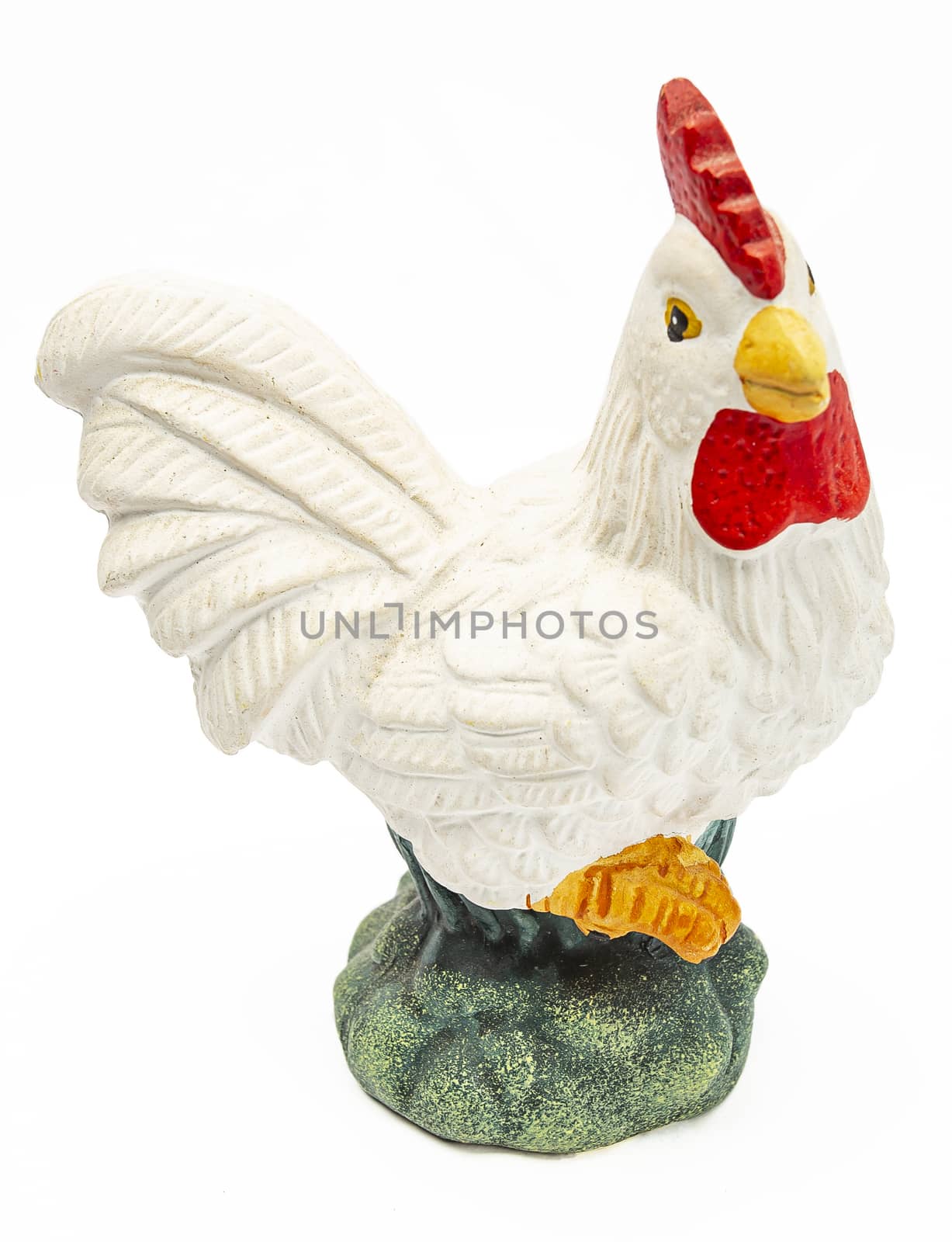 Small chicken figurine isolated on white background