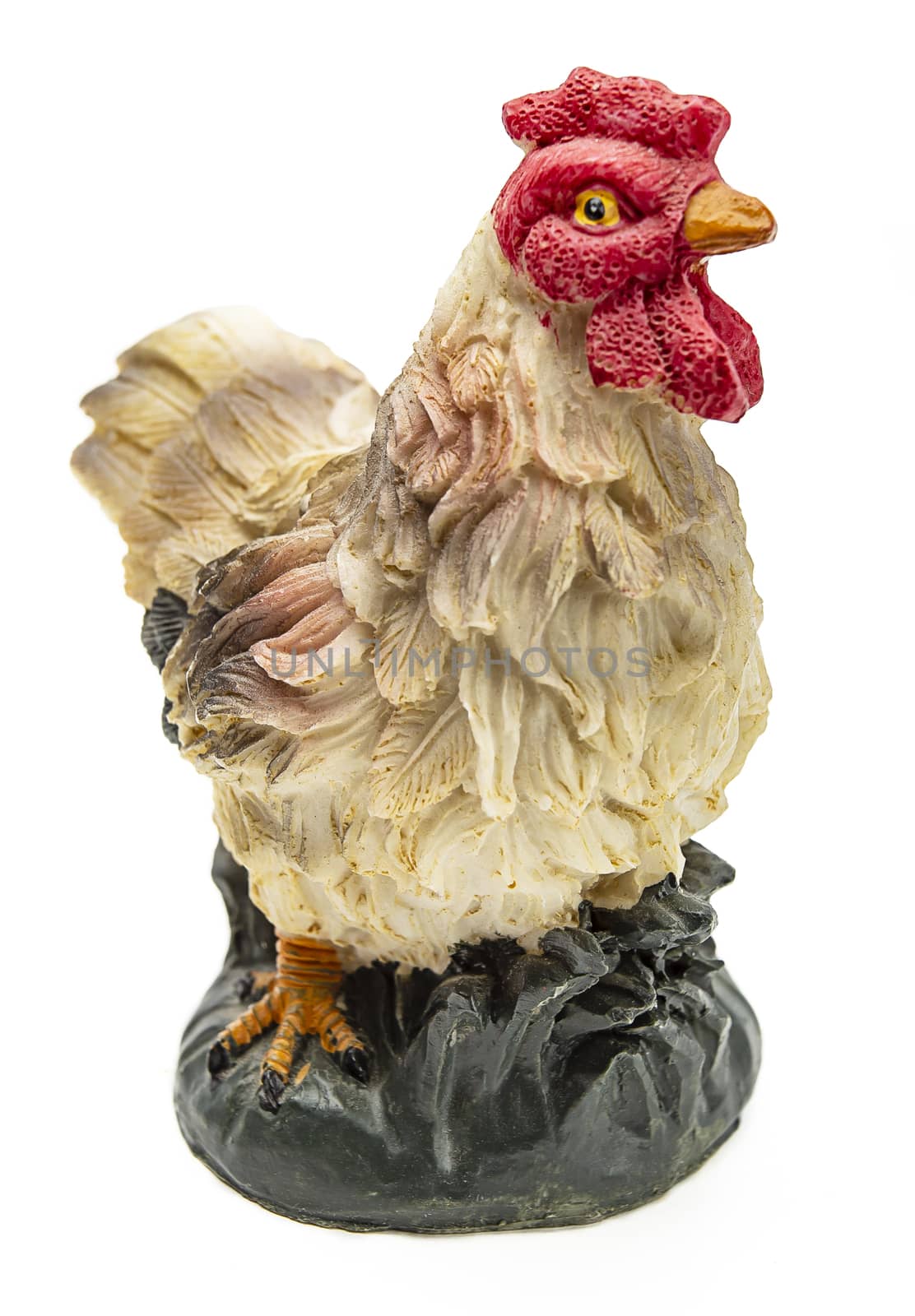 Isolated chicken figurine on a white background