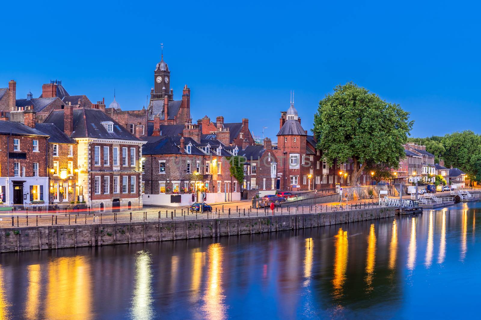 York cityscape along river ouse sunset dusk, York Yorkshire England UK.