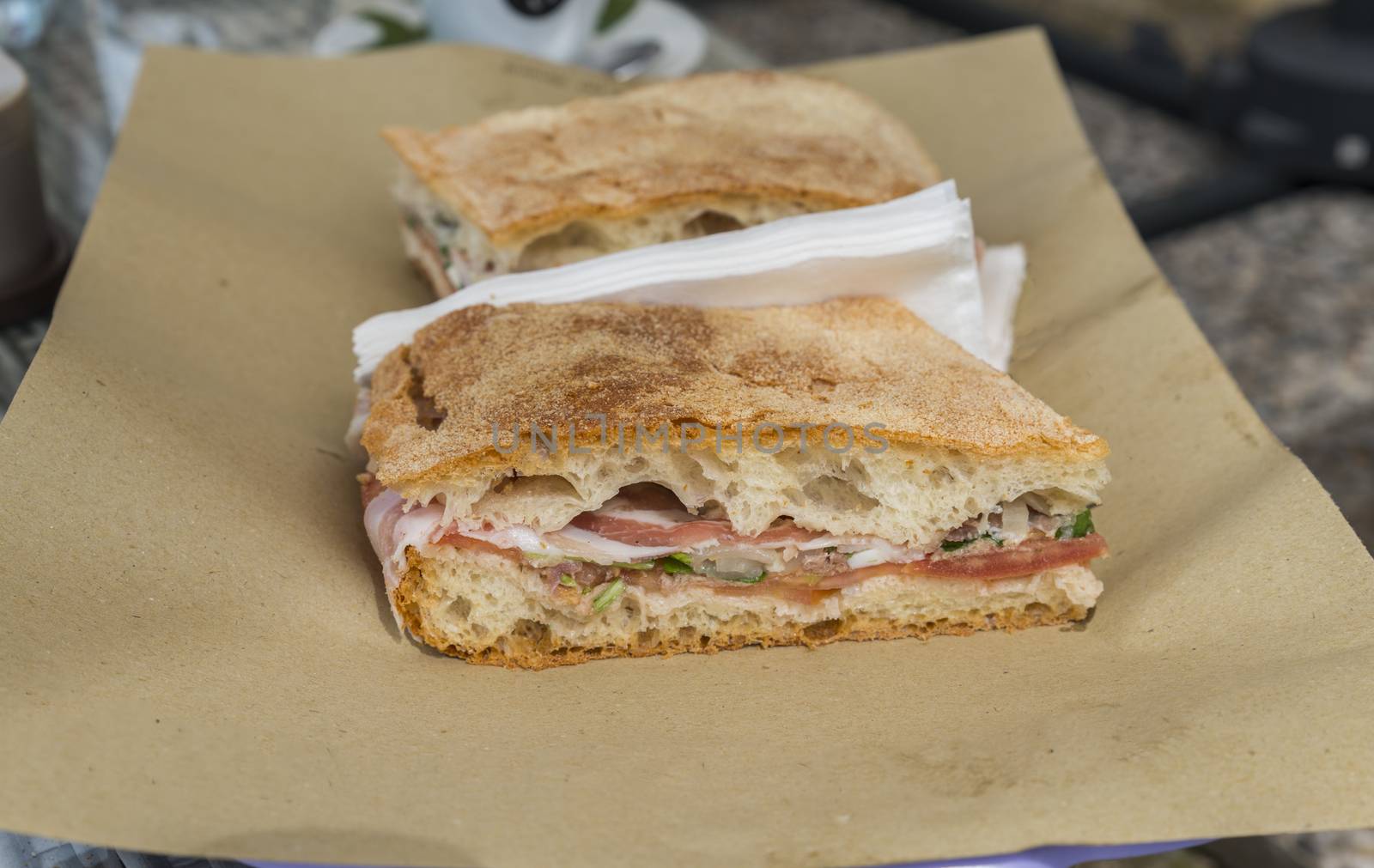 traditional Italian focaccia stuffing with cheese ham herbs and tomato
