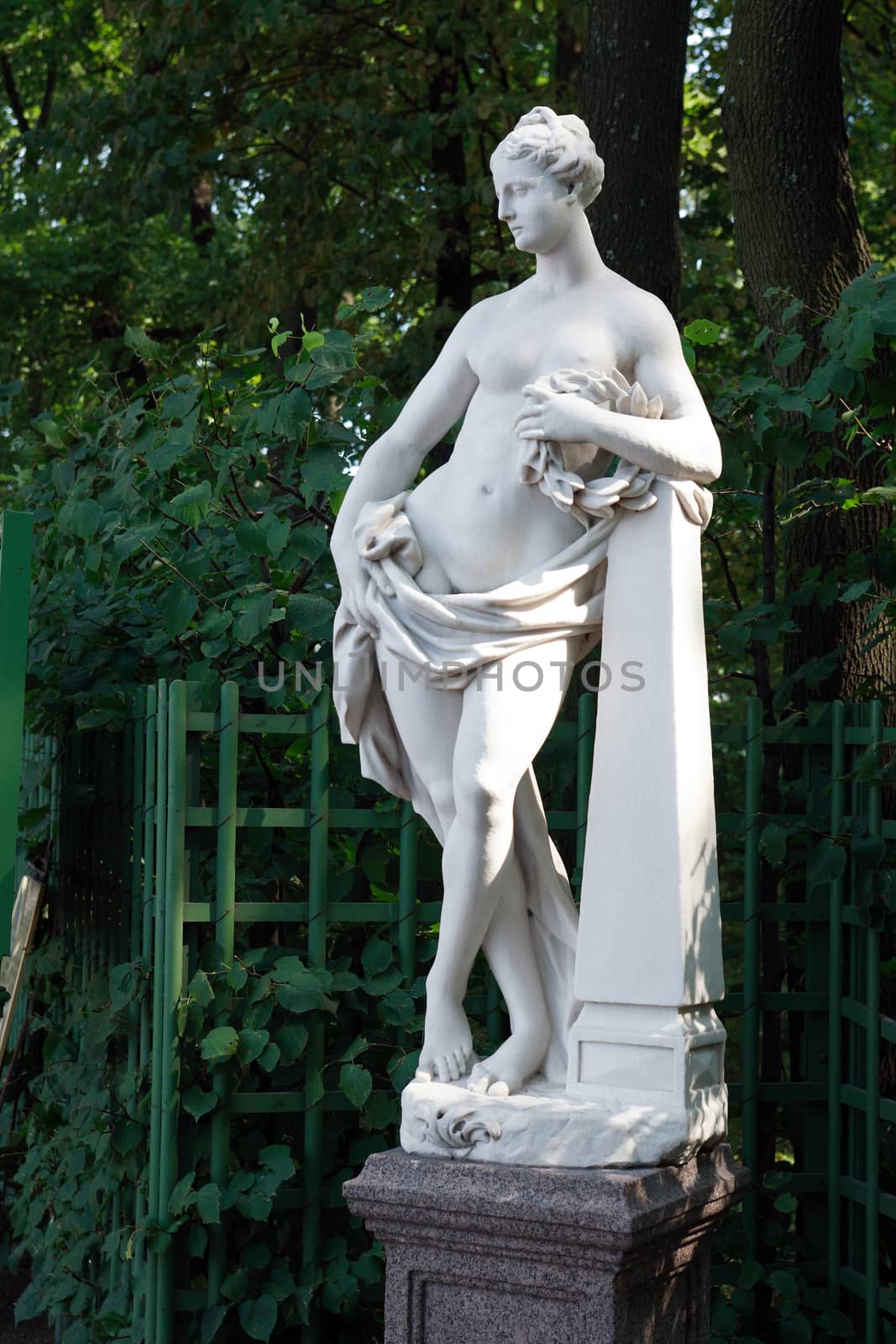 Beautiful old sculpture in famous Summer Garden. Saint Petersburg, Russia