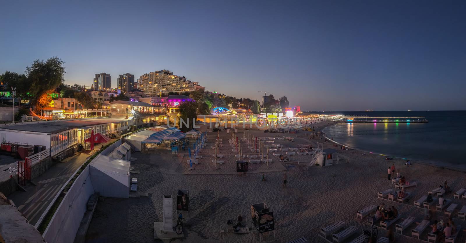 ODESSA, UKRAINE - 08.08.2018. Panoramic view of Arcadia city beach in a hot summer night. Famous touristic place in Ukraine