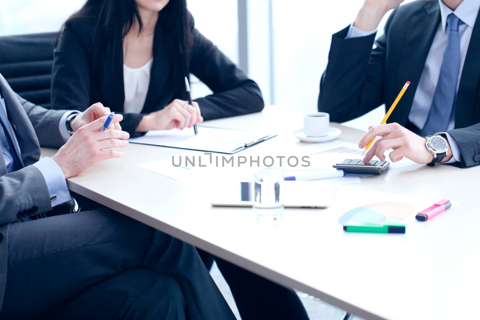 Business people working with documents and data statistics at office table