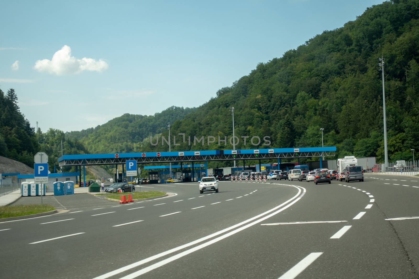 Macelj, Gruskovje - Border Slovenia and Croatia, July 9 2018: Cars, buses and trucks waiting to cross from Croatia to Slovenia in summer. Due Schengen regime controls on Slovene side are stricter.