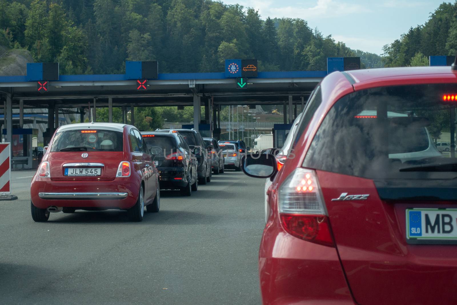 Macelj, Gruskovje - Border Slovenia and Croatia, July 9 2018: Cars, buses and trucks waiting to cross from Croatia to Slovenia in summer. Due Schengen regime controls on Slovene side are stricter.