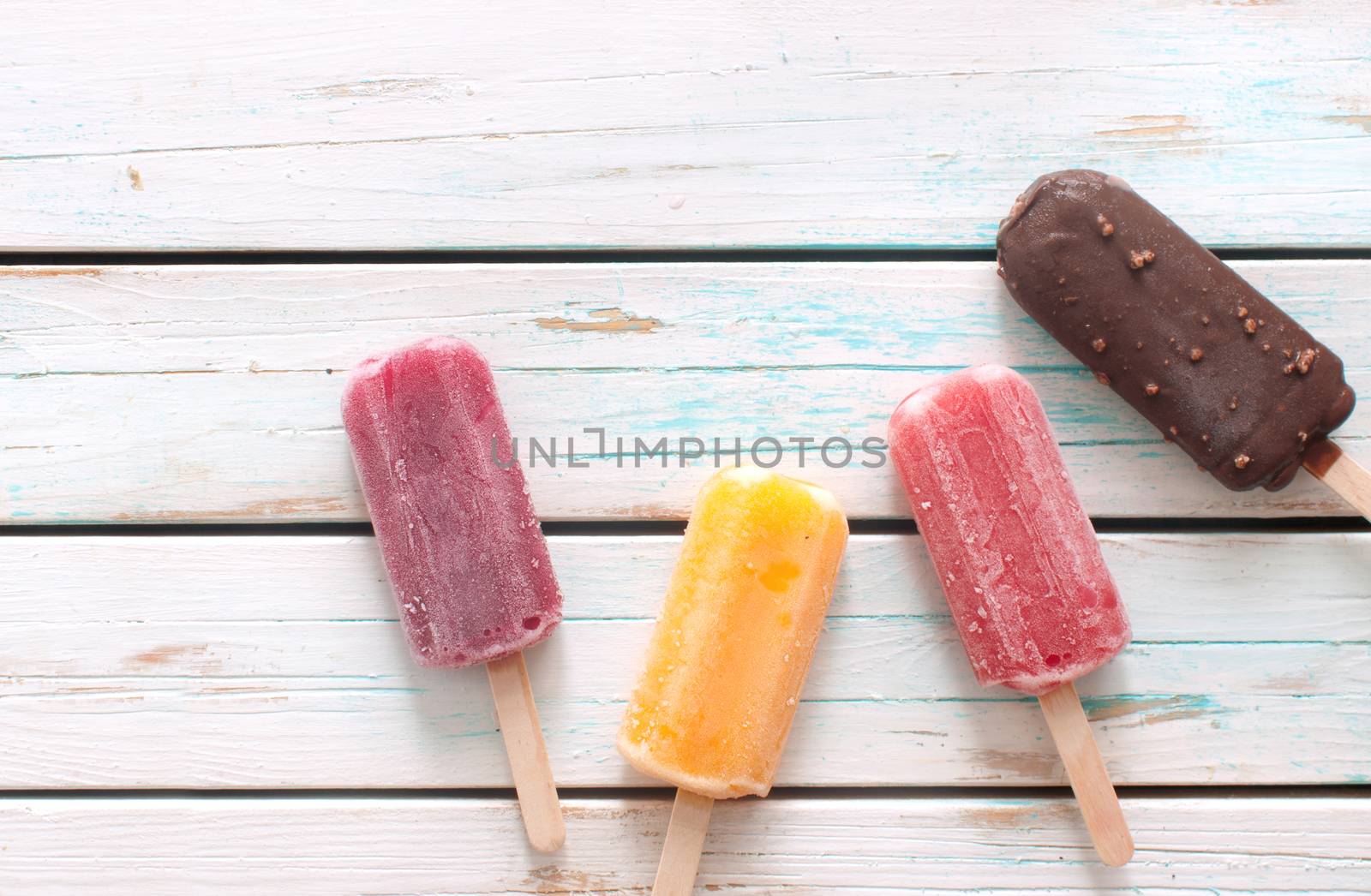 Assorted popsicles background by unikpix