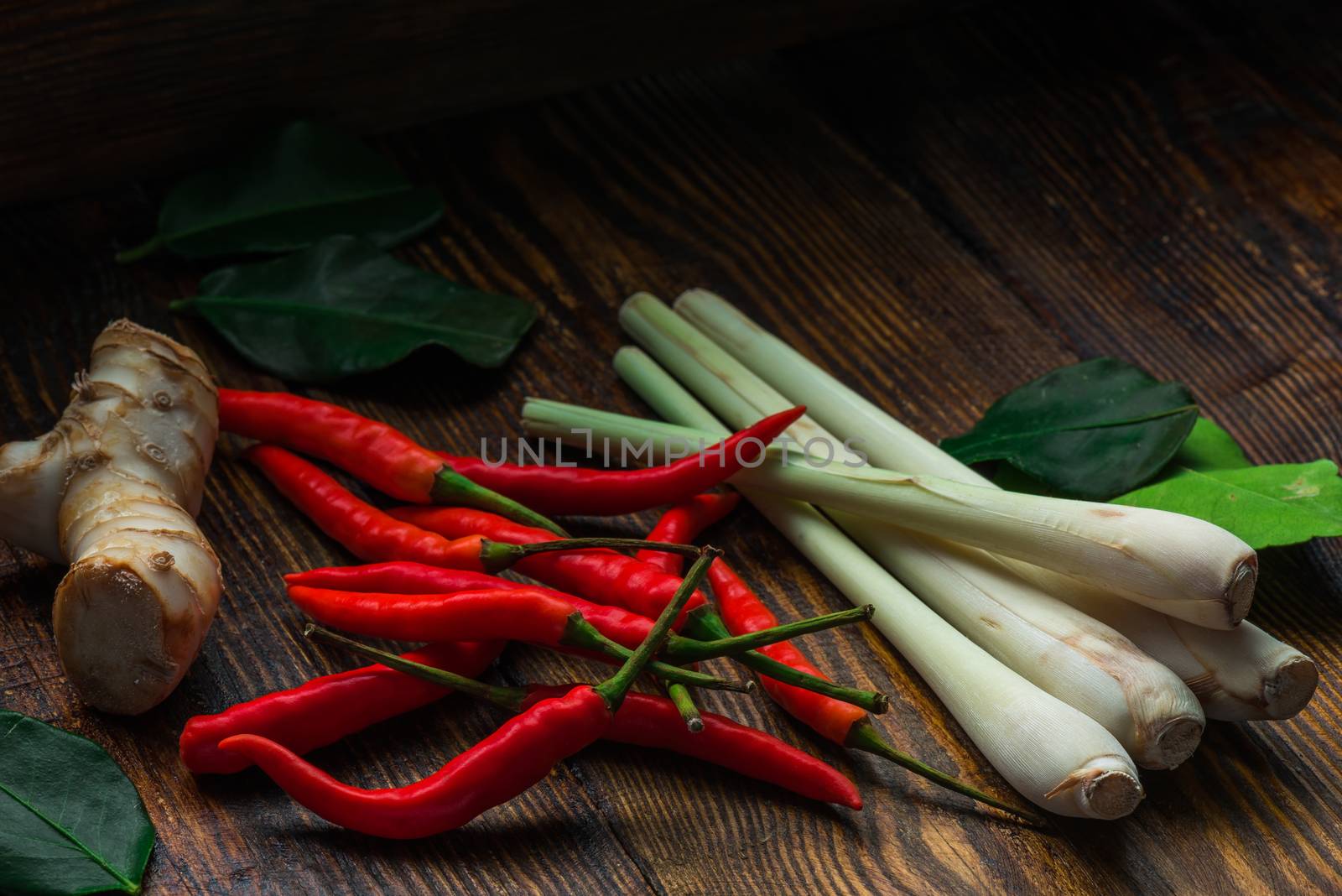 Chili peppers with galangal root, leaf of kaffir lime and lemongrass by Seva_blsv